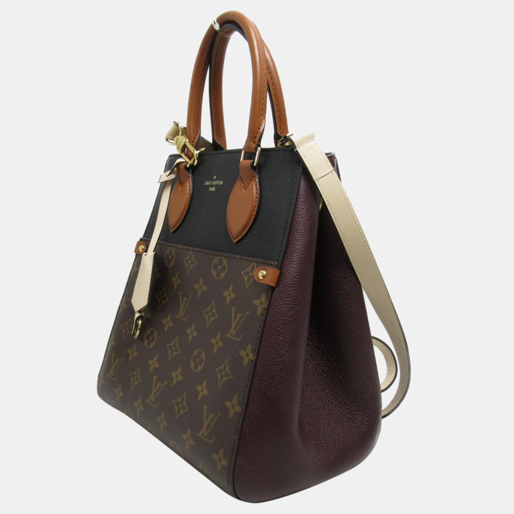 

Louis Vuitton Brown Monogram Coated Canvas Fold Tote MM Shoulder Bag