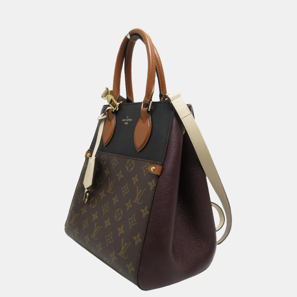 

Louis Vuitton Brown Monogram Coated Canvas Fold Tote MM Shoulder Bag