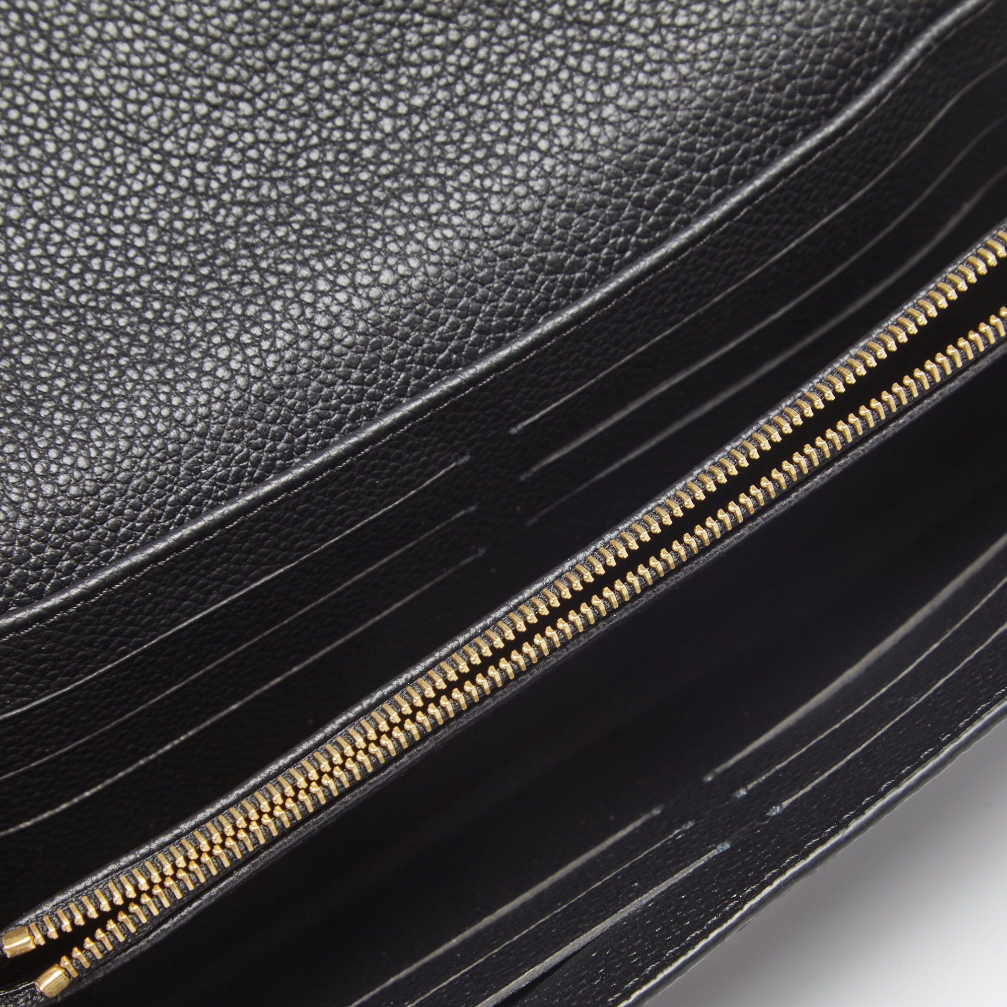 

Louis Vuitton Black Monogram Empreinte Leather Sarah Wallet