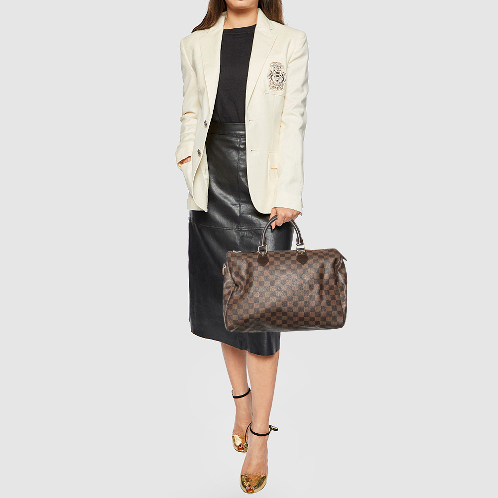 

Louis Vuitton Damier Ebene Canvas Speedy 35 Bag, Brown