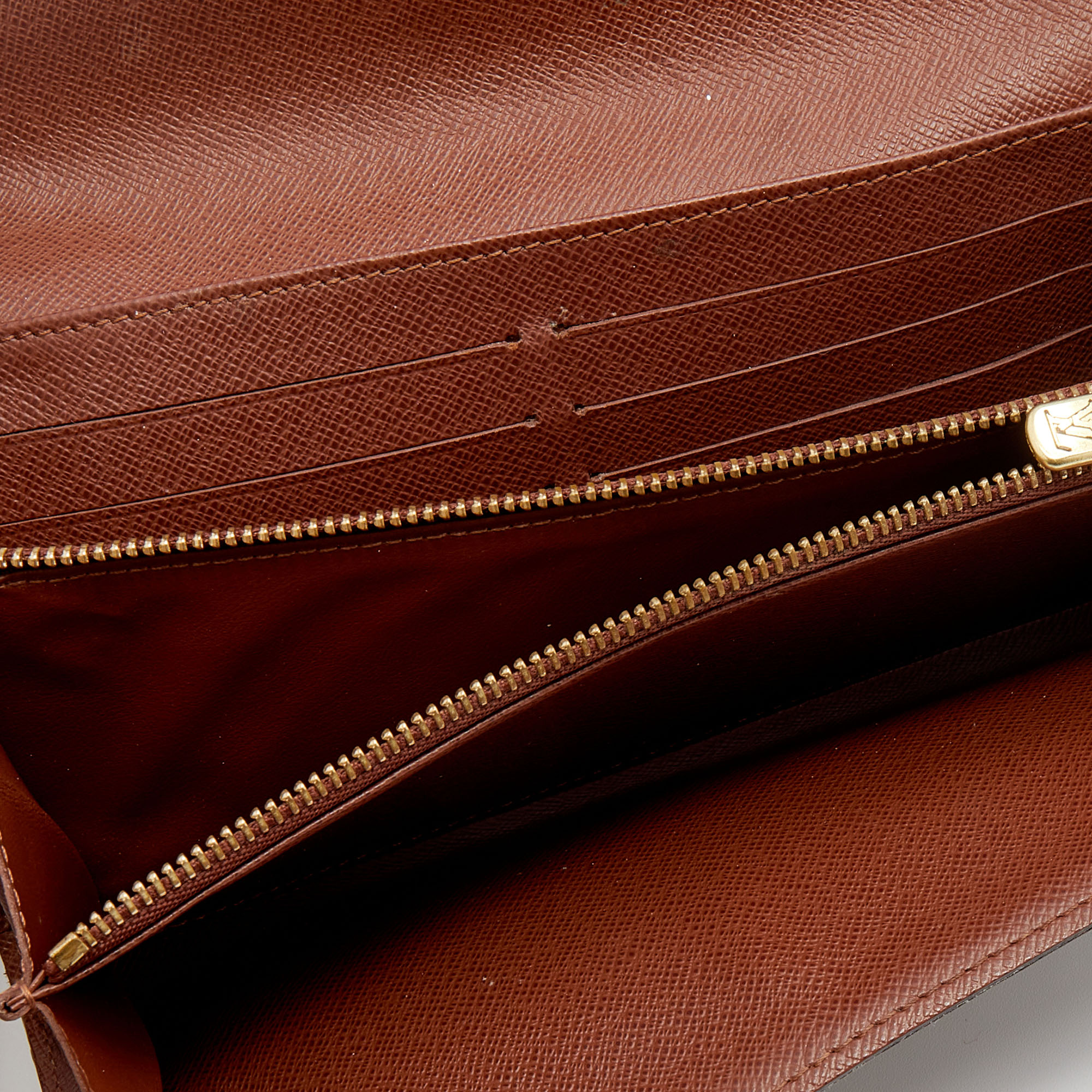 

Louis Vuitton Monogram Canvas Sarah Wallet, Brown
