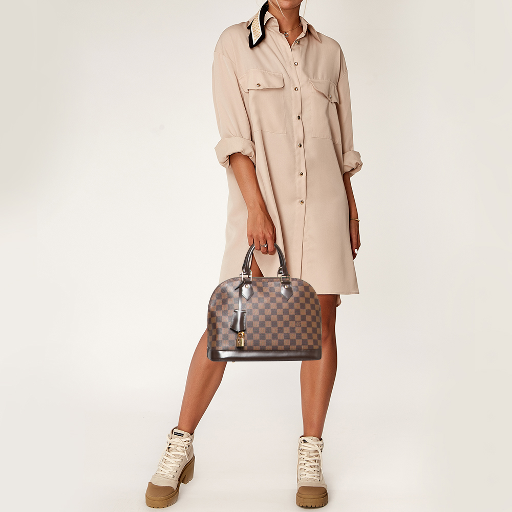 

Louis Vuitton Damier Ebene Canvas Alma PM Bag, Brown