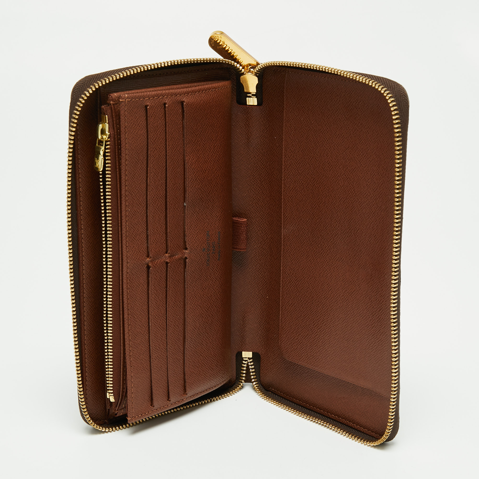 

Louis Vuitton Monogram Canvas Zippy Organizer Wallet, Brown
