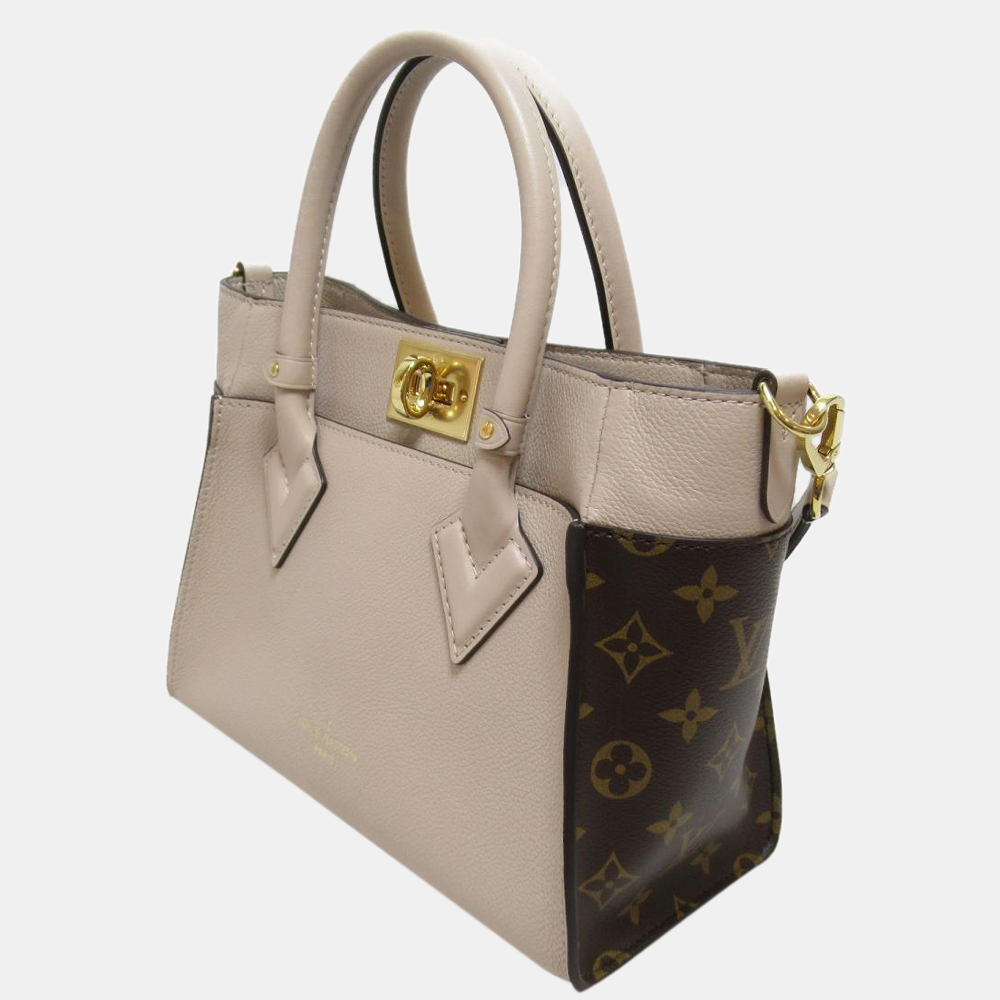 

Louis Vuitton Beige/Brown Monogram canvas and Leather On My Side PM Bag