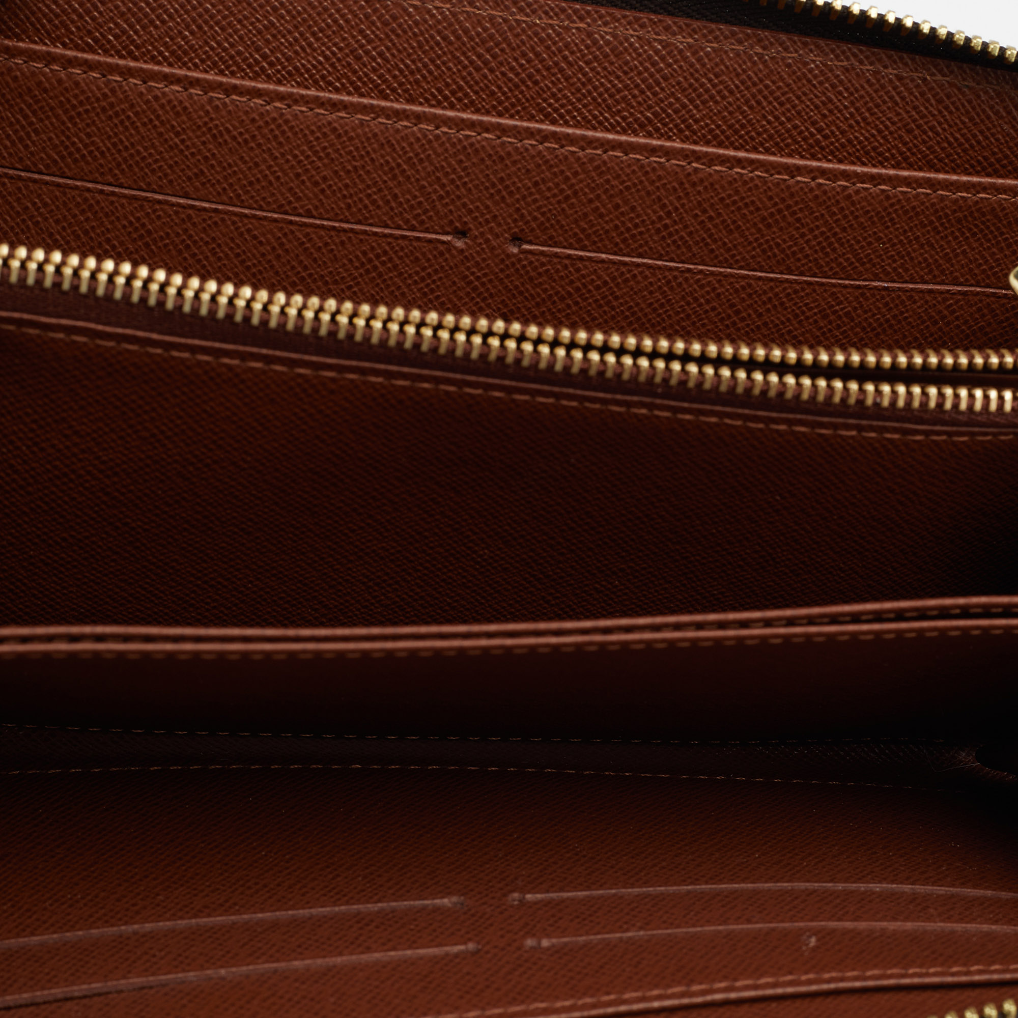 

Louis Vuitton Monogram Canvas Zippy Wallet, Brown