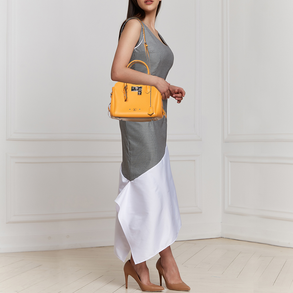 

Louis Vuitton Safran Leather Milla PM Bag, Orange