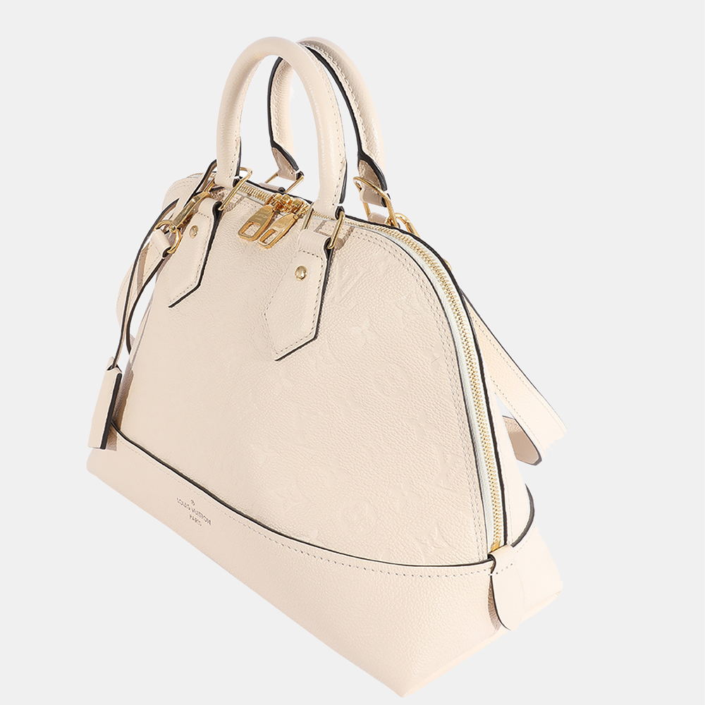 

Louis Vuitton Creme Monogram Canvas Empreinte Neo Alma PM Bag, Cream