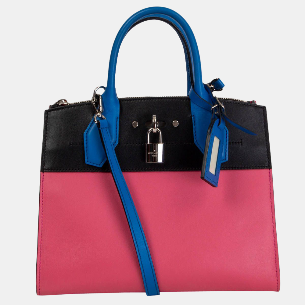 Well known for their in fashion designs and admirable build Louis Vuitton bag are at the top of every woman wardrobe. A fine Tricolor bag like this is a great way to start your day with. Add style to your outfit with this Calfskin Leather bag.