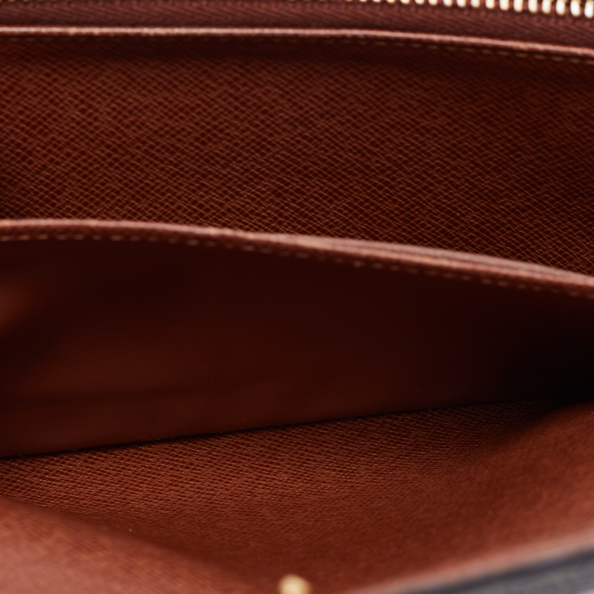

Louis Vuitton Brown Monogram Canvas Sarah Wallet