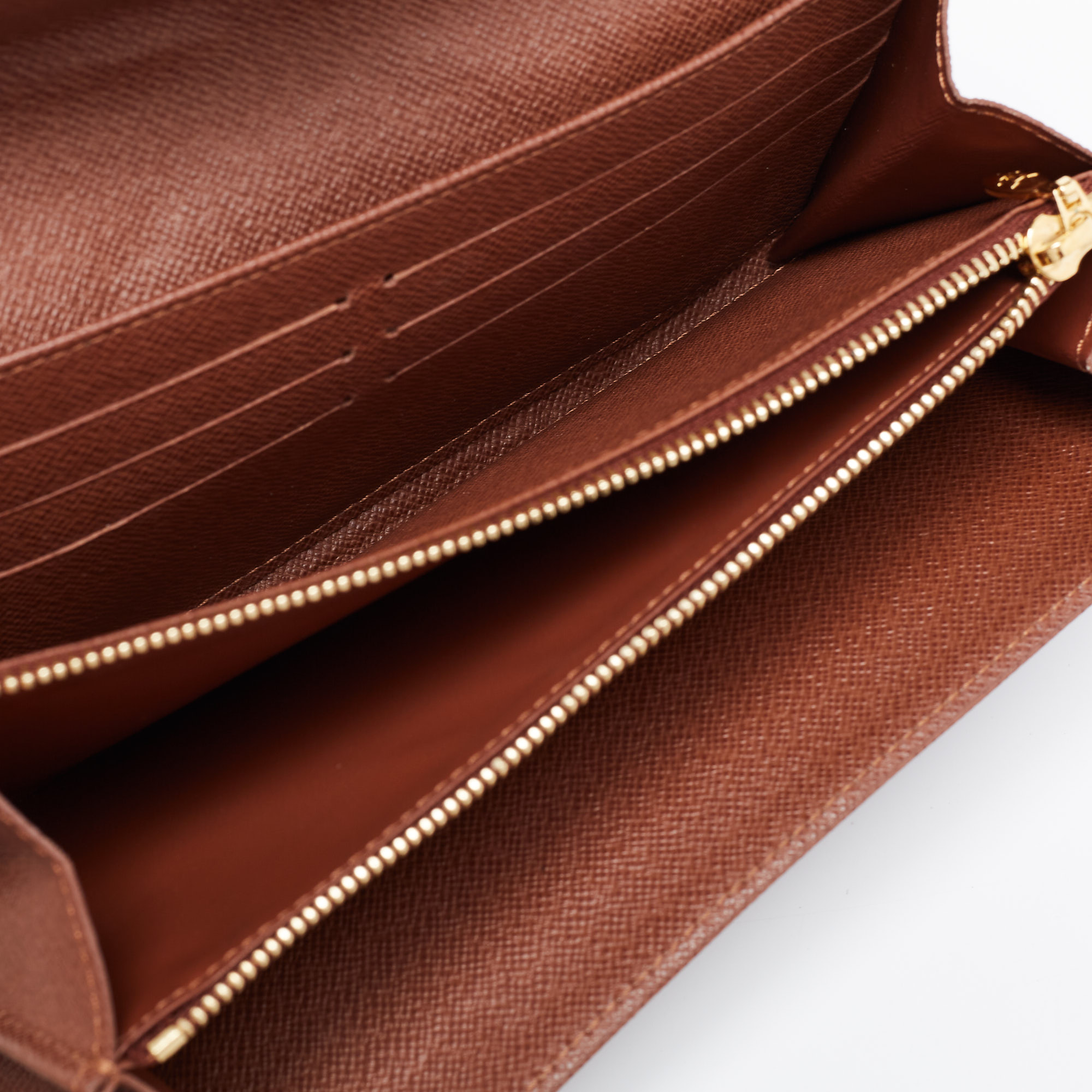 

Louis Vuitton Monogram Canvas Etoile Sarah Wallet, Brown