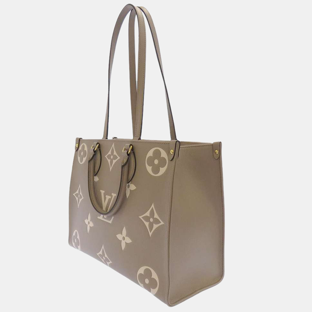 

Louis Vuitton Cream Monogram Empreinte Leather Onthego MM Tote Bag