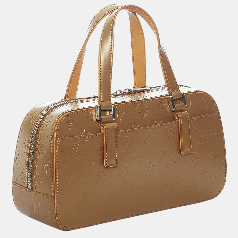 

Louis Vuitton Gold Monogram Mat Shelton