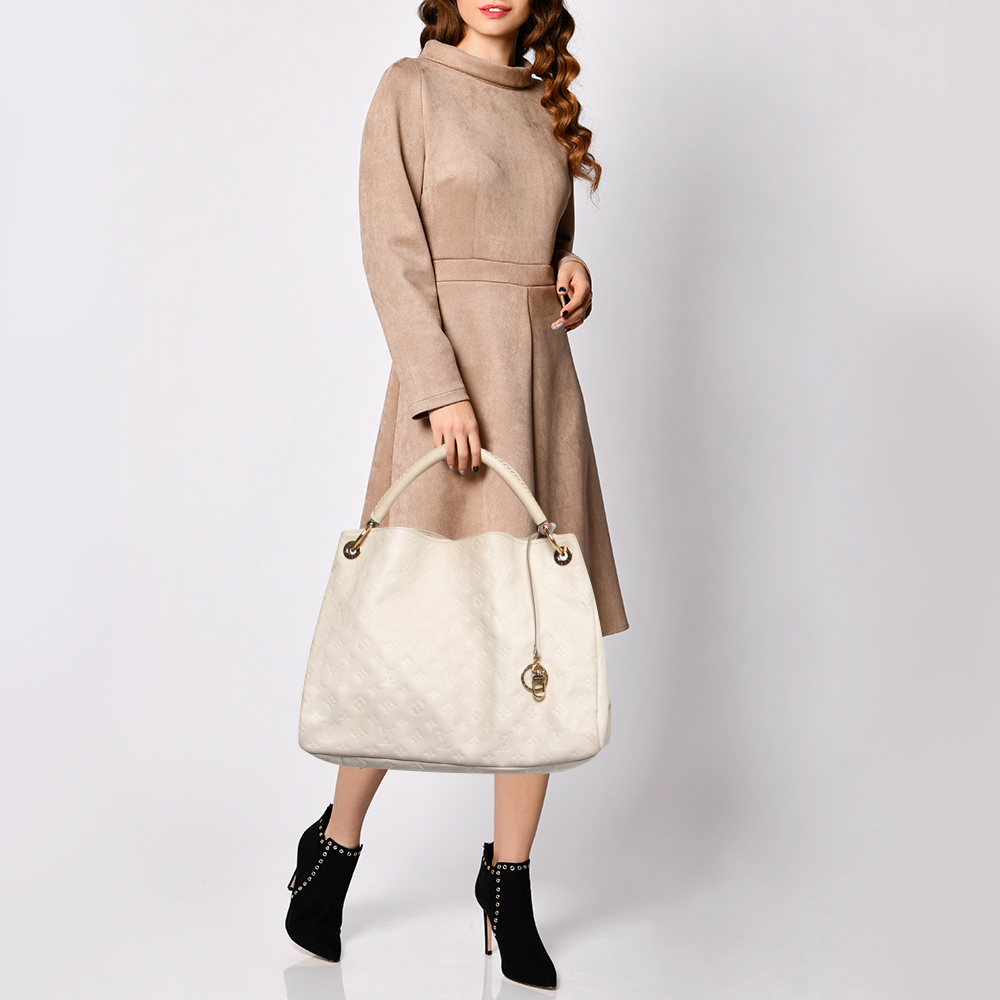 

Louis Vuitton Beige Monogram Empreinte Leather Artsy MM Bag, White