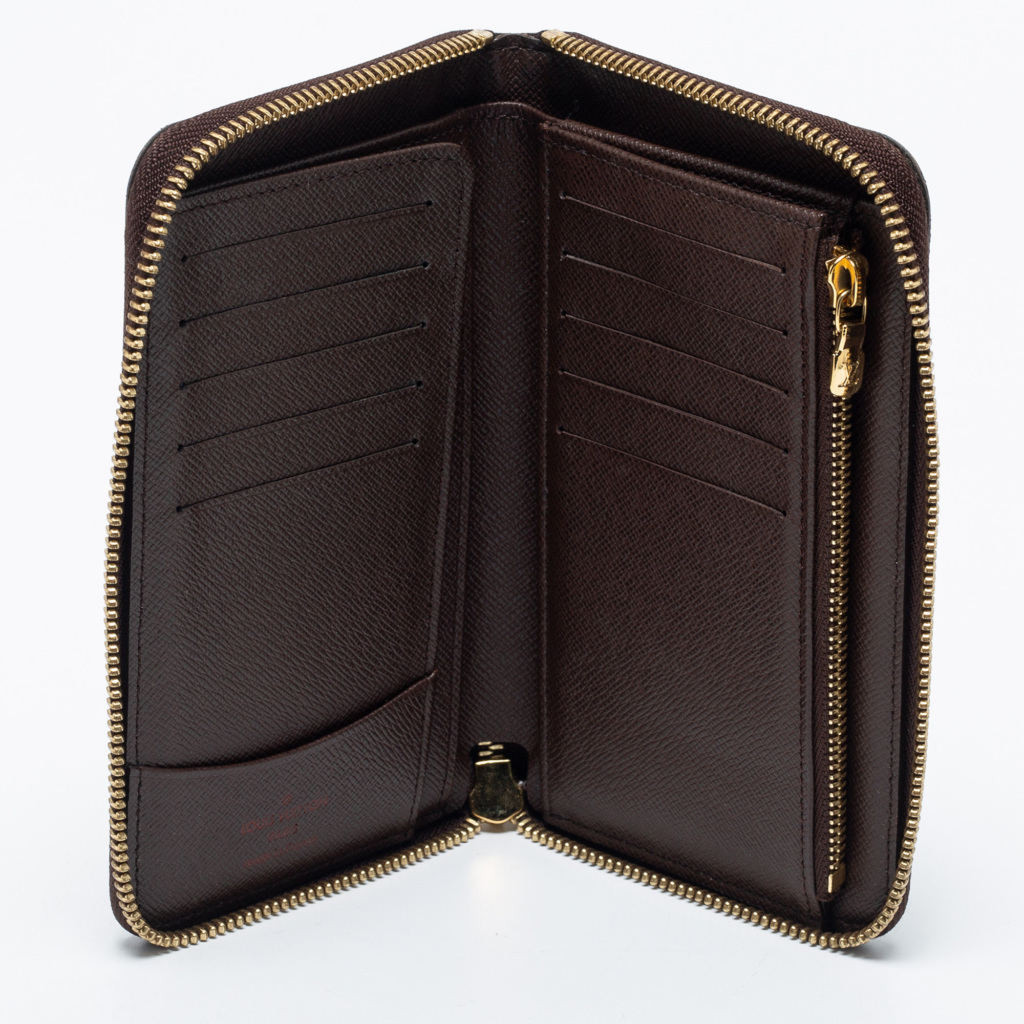 

Louis Vuitton Damier Ebene Canvas Zippy Compact Wallet, Brown