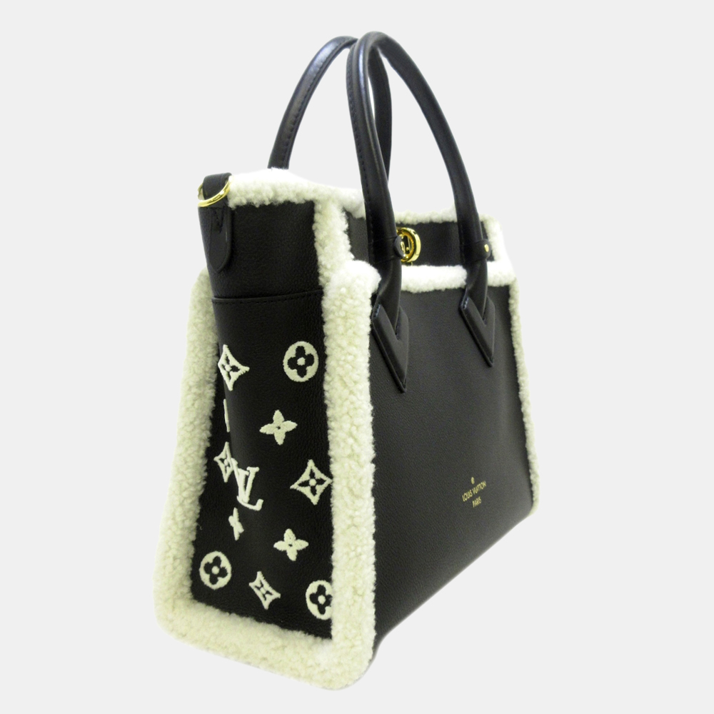 

Louis Vuitton Black/White Monogram On My Side MM