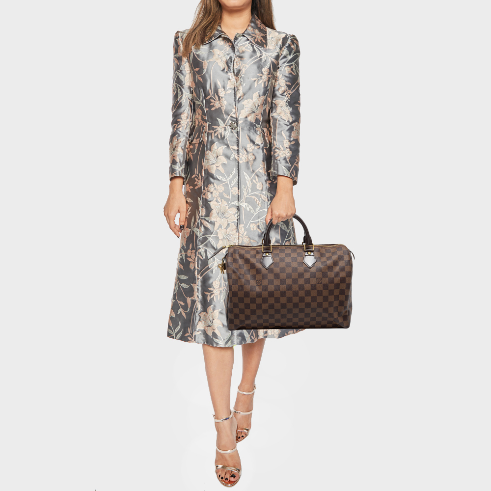 

Louis Vuitton Damier Ebene Canvas Speedy 35 Bag, Brown