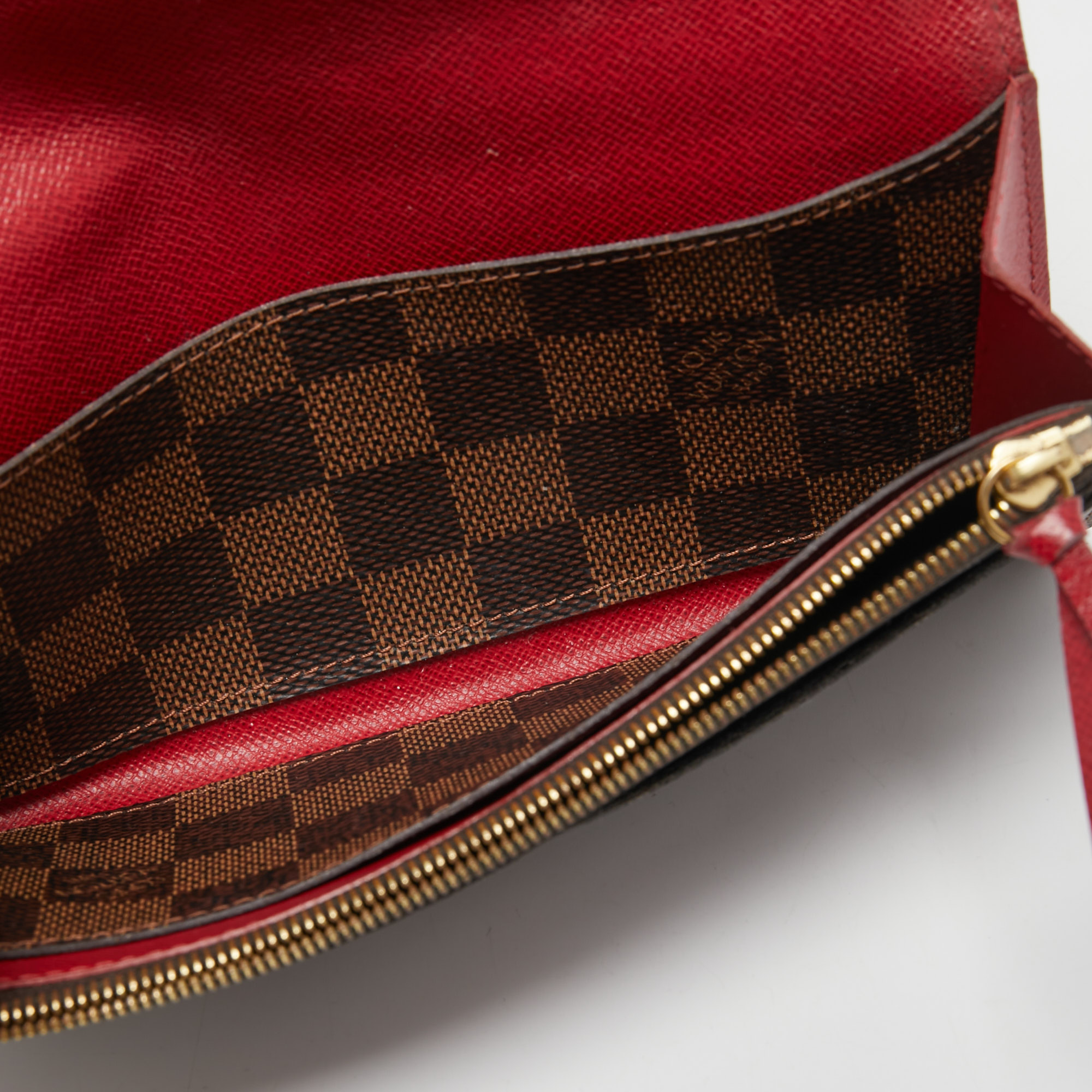 

Louis Vuitton Damier Ebene Canvas Emilie Wallet, Brown