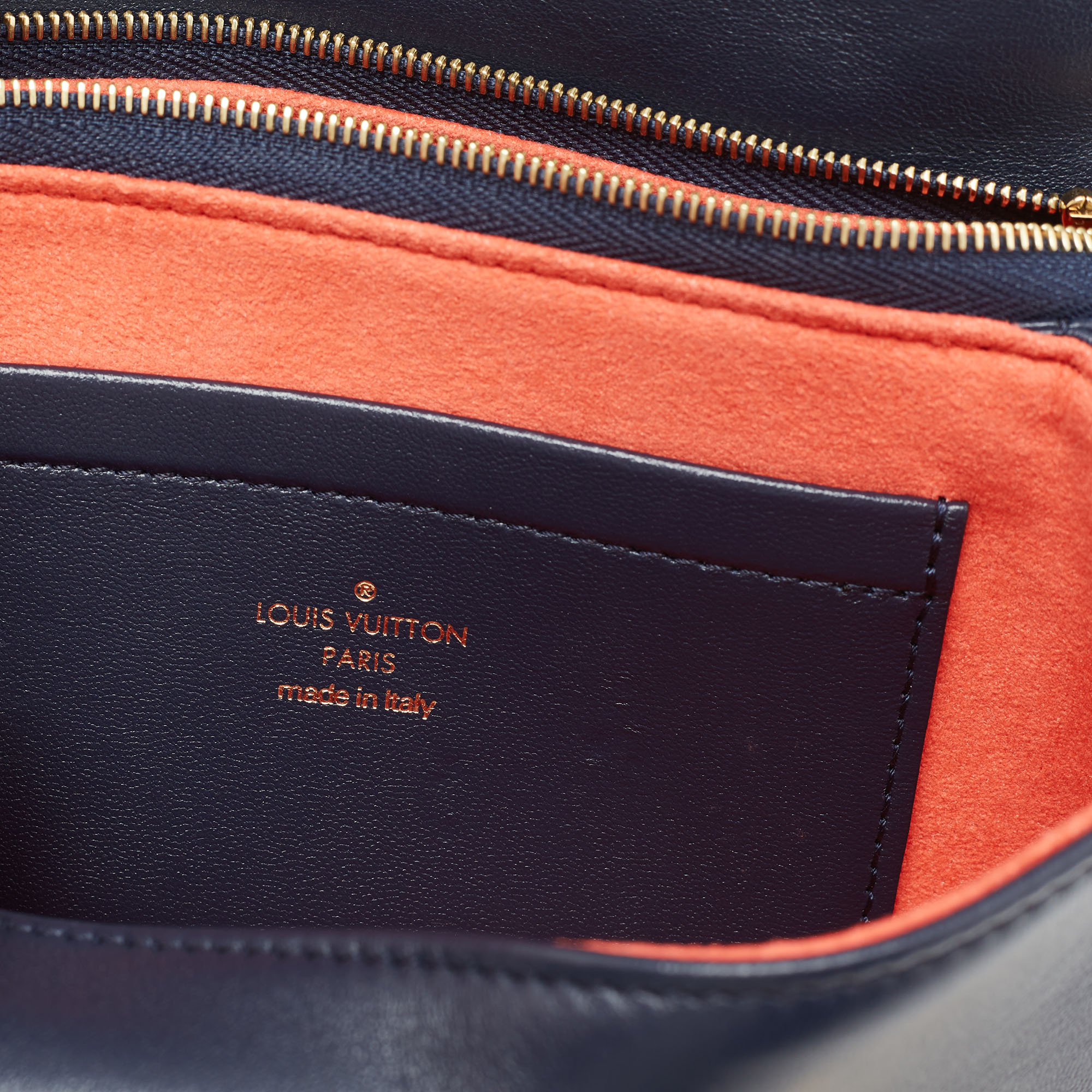 Louis Vuitton Navy Blue Garden Monogram Embossed Leather Coussin Pochette  Louis Vuitton | The Luxury Closet
