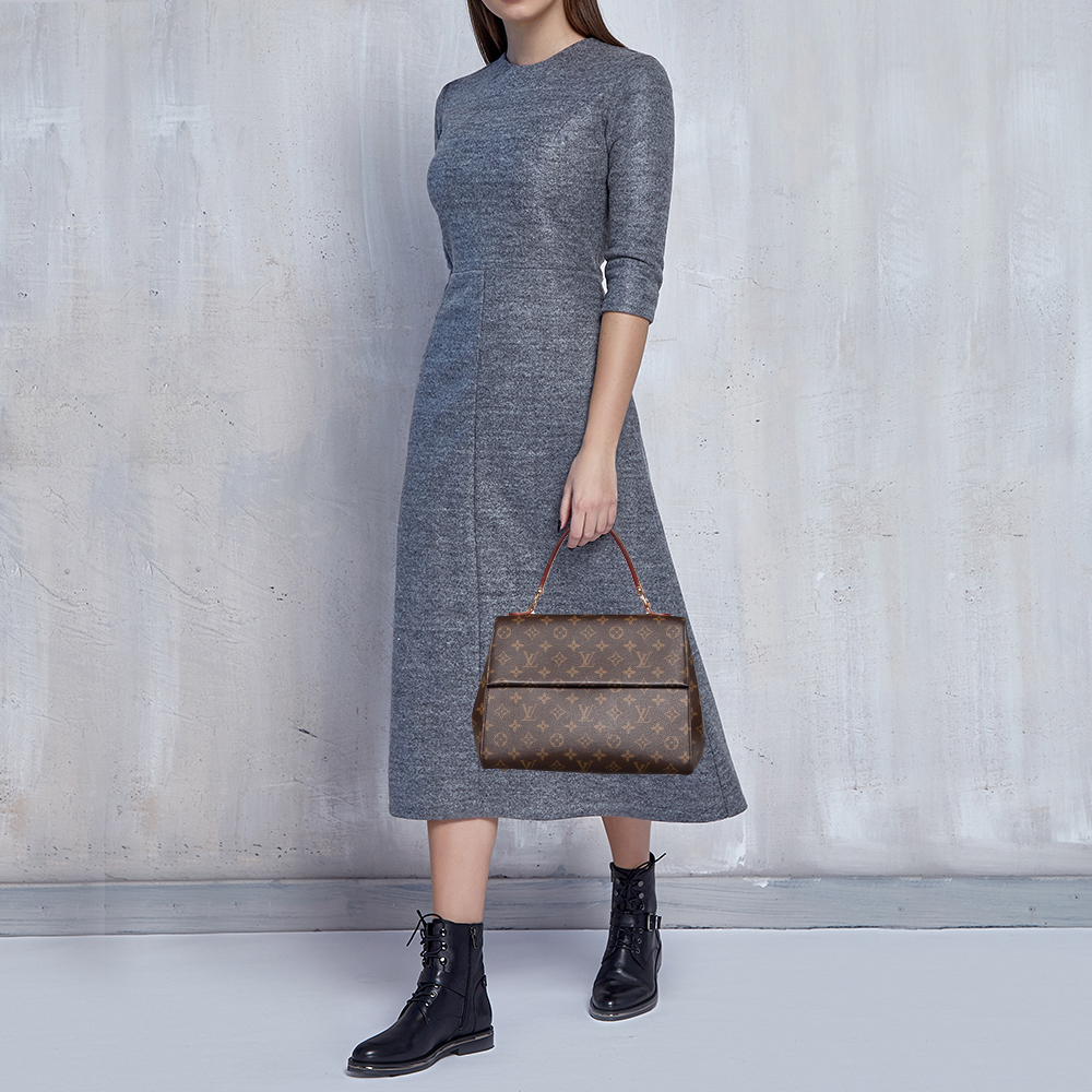 

Louis Vuitton Monogram Canvas Cluny MM Bag, Brown