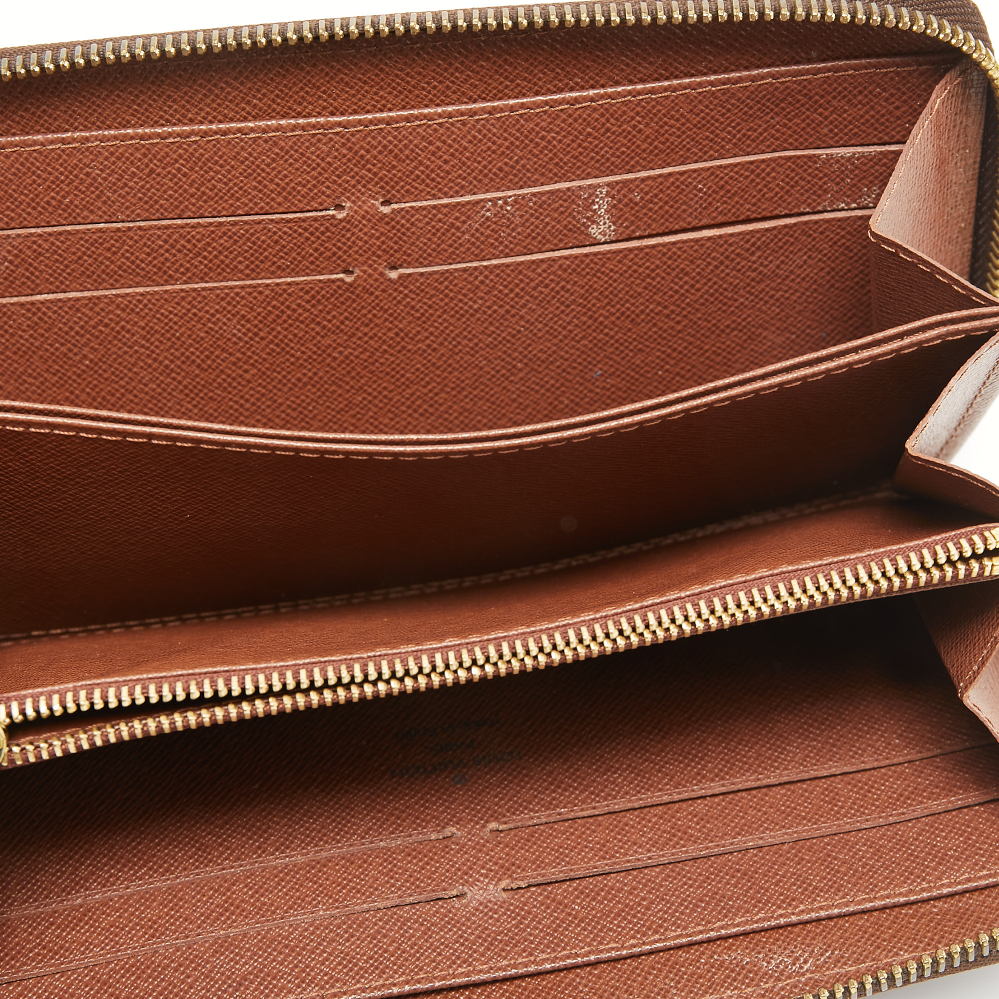 

Louis Vuitton Monogram Canvas Zippy Wallet, Brown