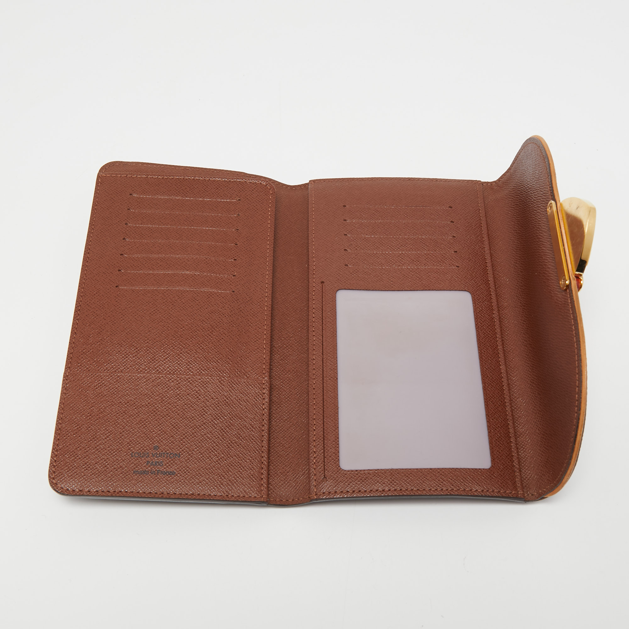 

Louis Vuitton Monogram Canvas Eugenie Wallet, Brown