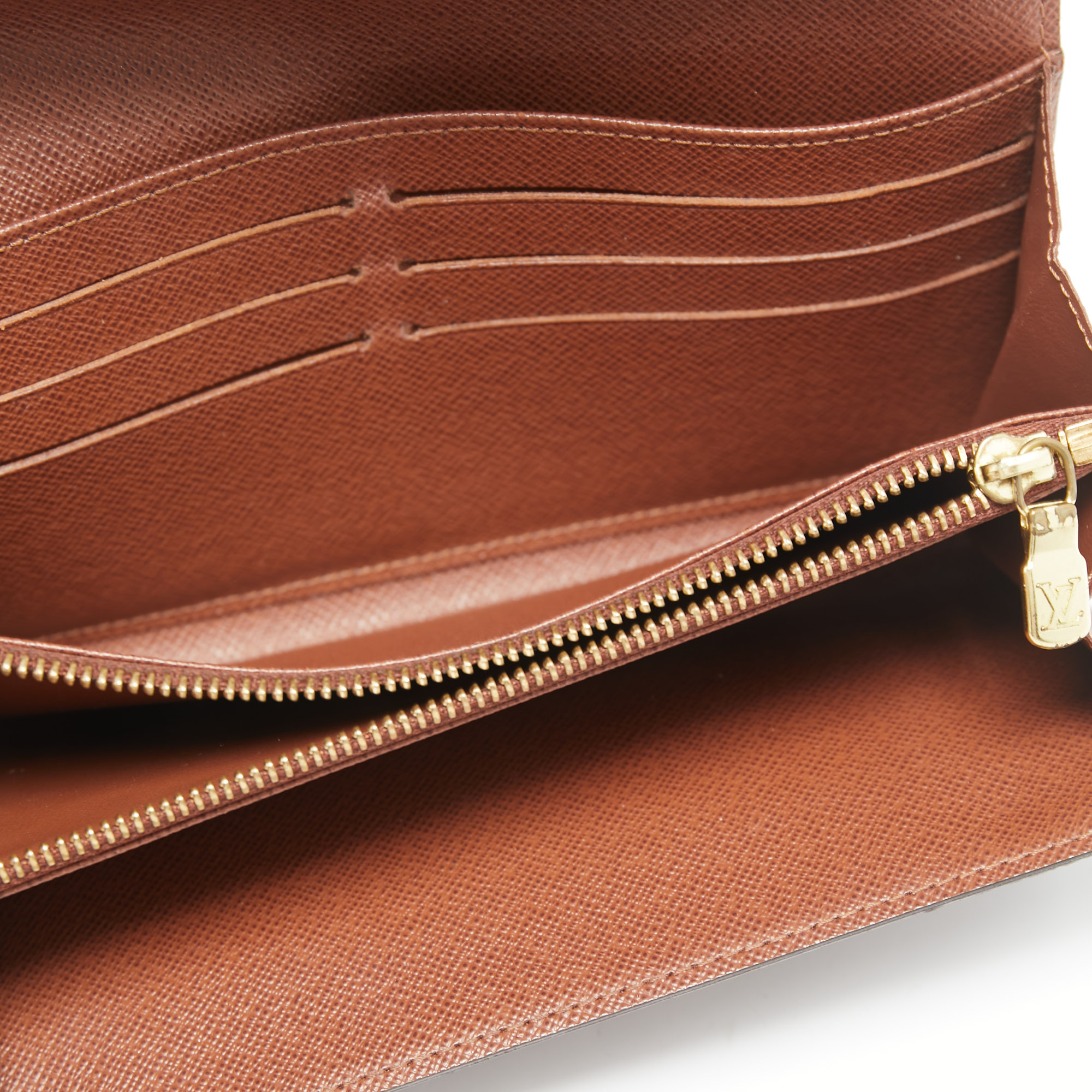 

Louis Vuitton Monogram Canvas Sarah Wallet, Brown