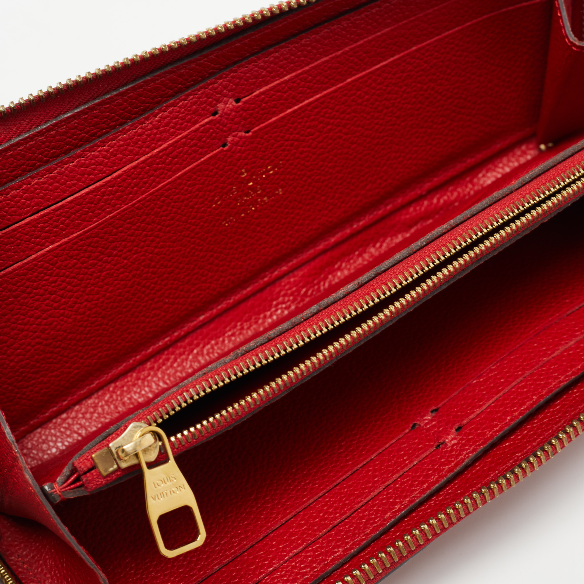 

Louis Vuitton Scarlet Empreinte Monogram Clemence Wallet, Red