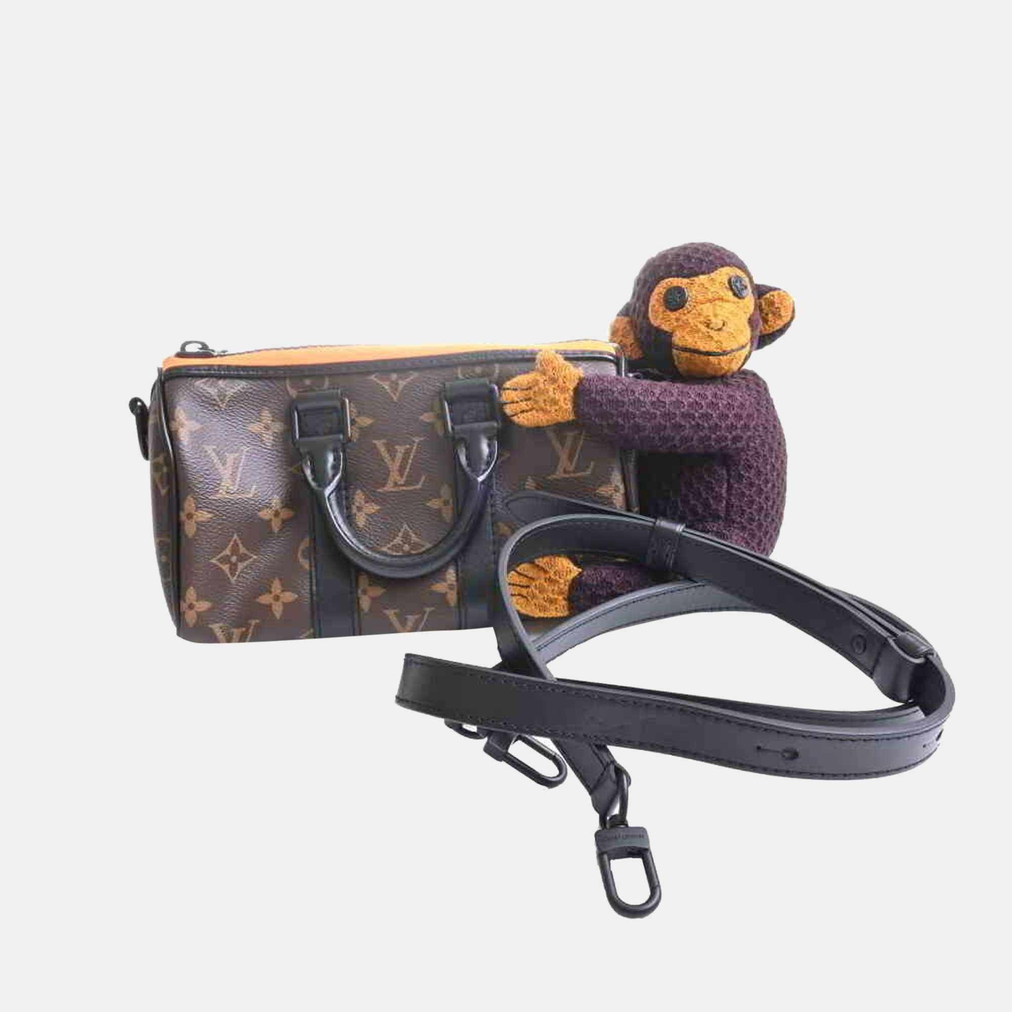 

Louis Vuitton Brown Monogram Canvas with LV Friend Plush Monkey XS Keepall Bandouliere Bag