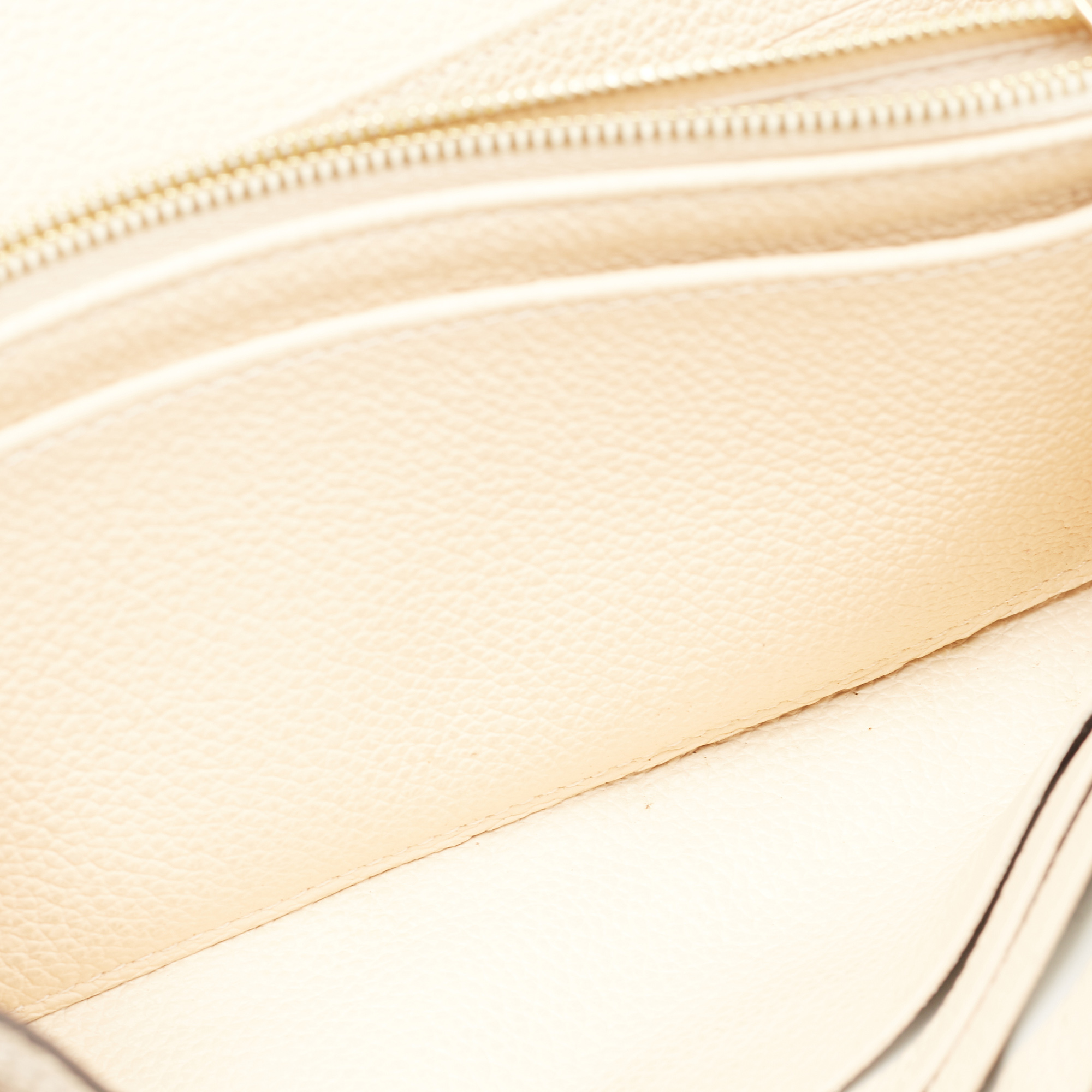 

Louis Vuitton Cream Monogram Empreinte Leather Sarah Wallet