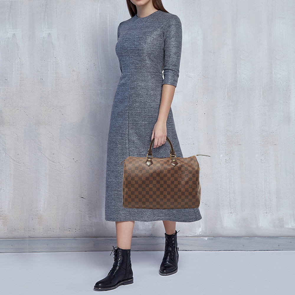 

Louis Vuitton Damier Ebene Canvas Speedy 35 Bag, Brown