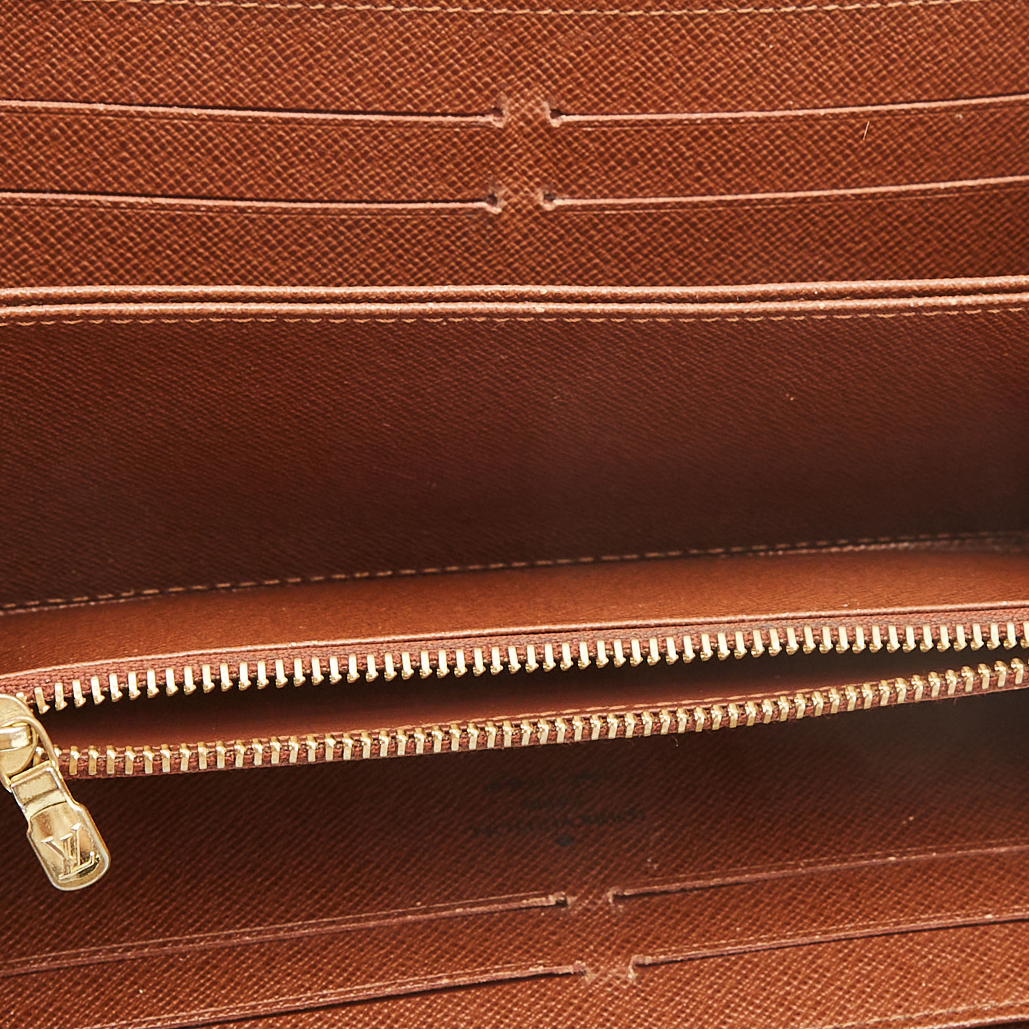 

Louis Vuitton Monogram Canvas Zippy Wallet, Brown