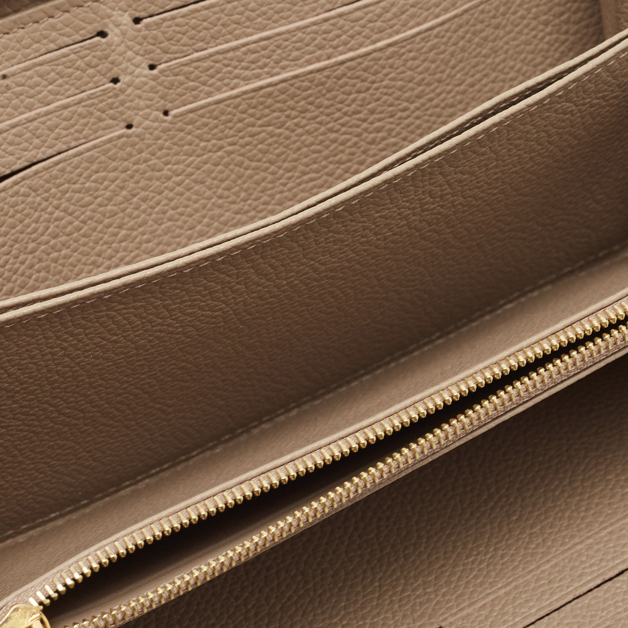 

Louis Vuitton Tourterelle/Creme Monogram Empreinte Leather Zippy Wallet, Beige