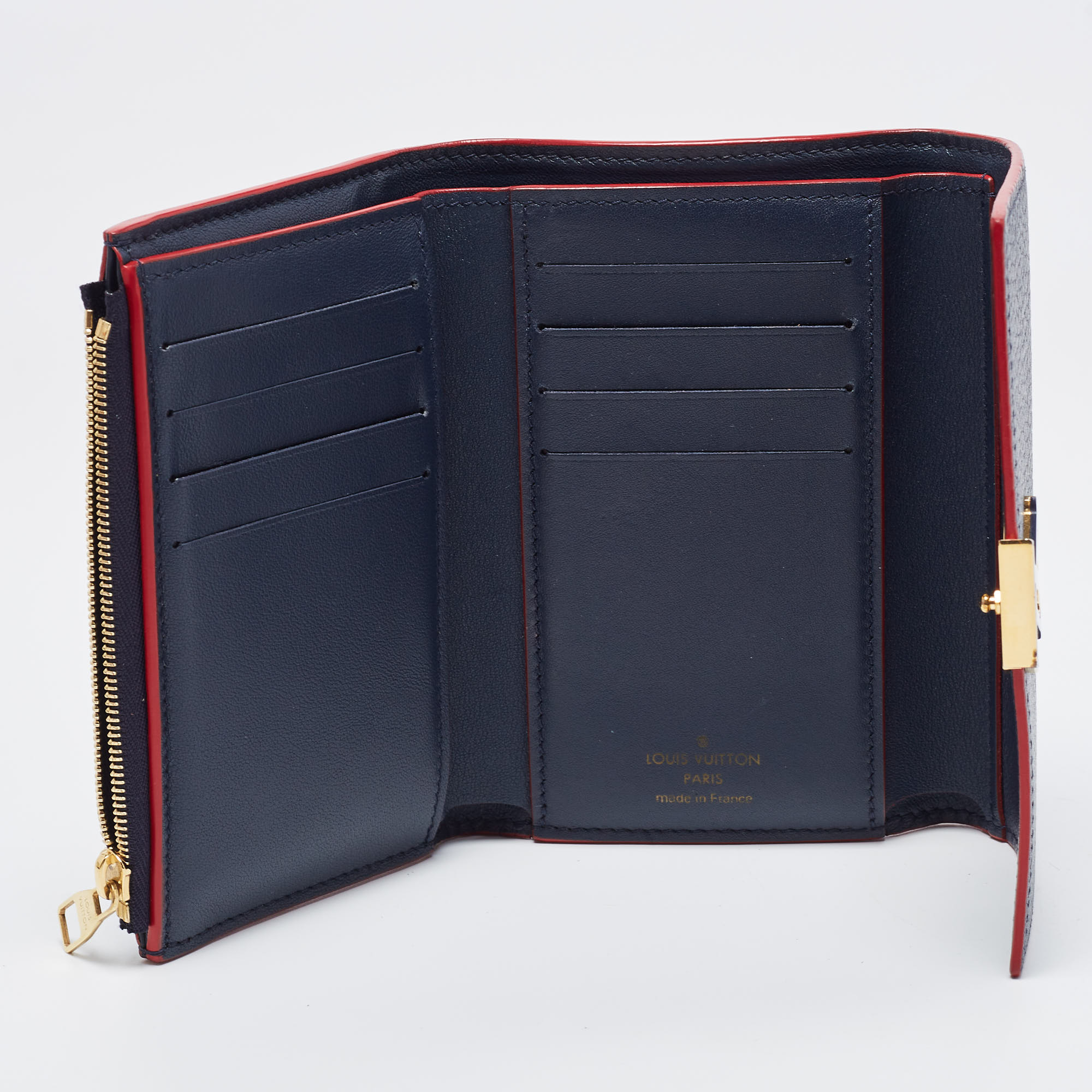 

Louis Vuitton Marine Rouge Taurillion Leather Capucines Compact Wallet, Navy blue