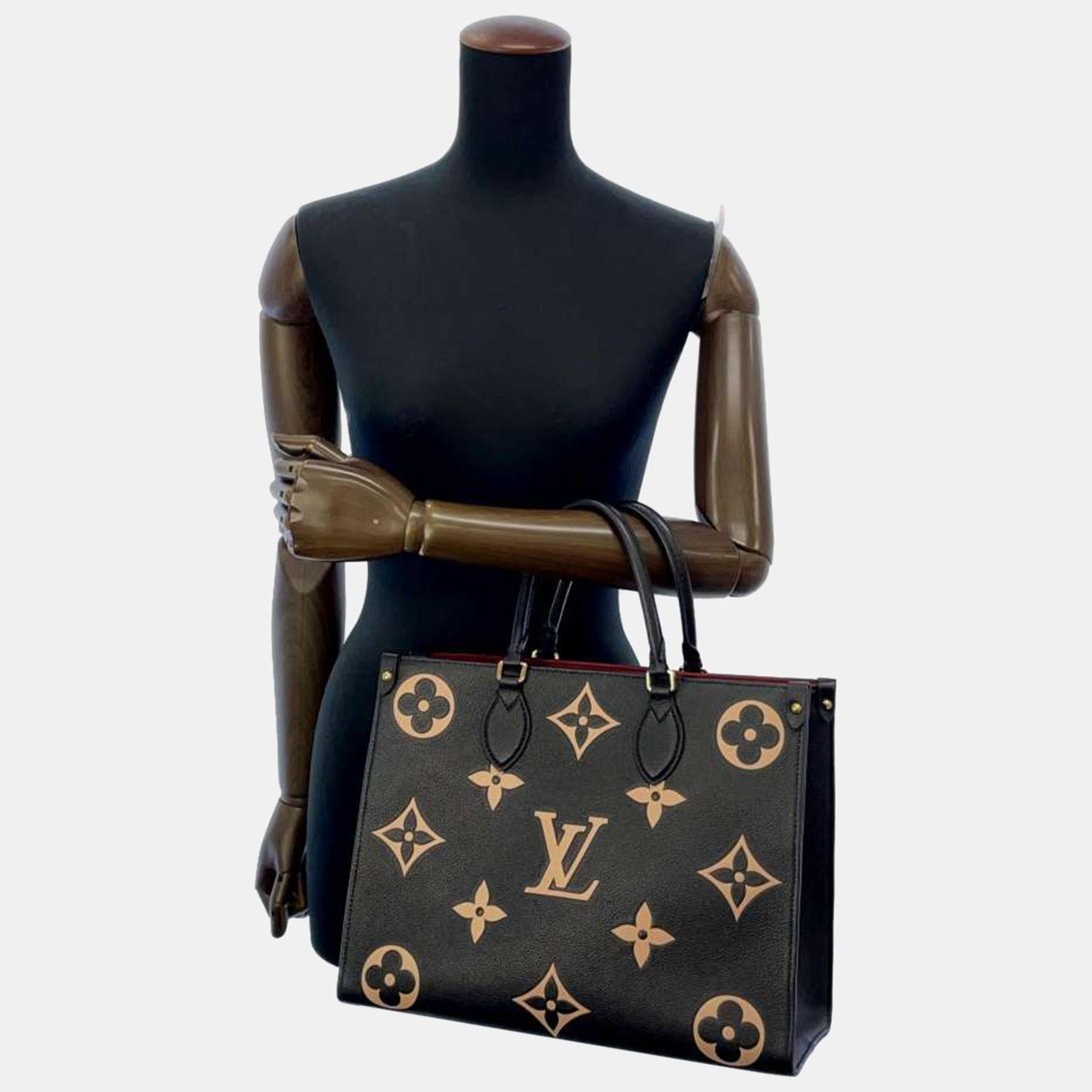 

Louis Vuitton Bicolor Monogram Giant Empreinte Leather OnTheGo MM Tote Bag, Black