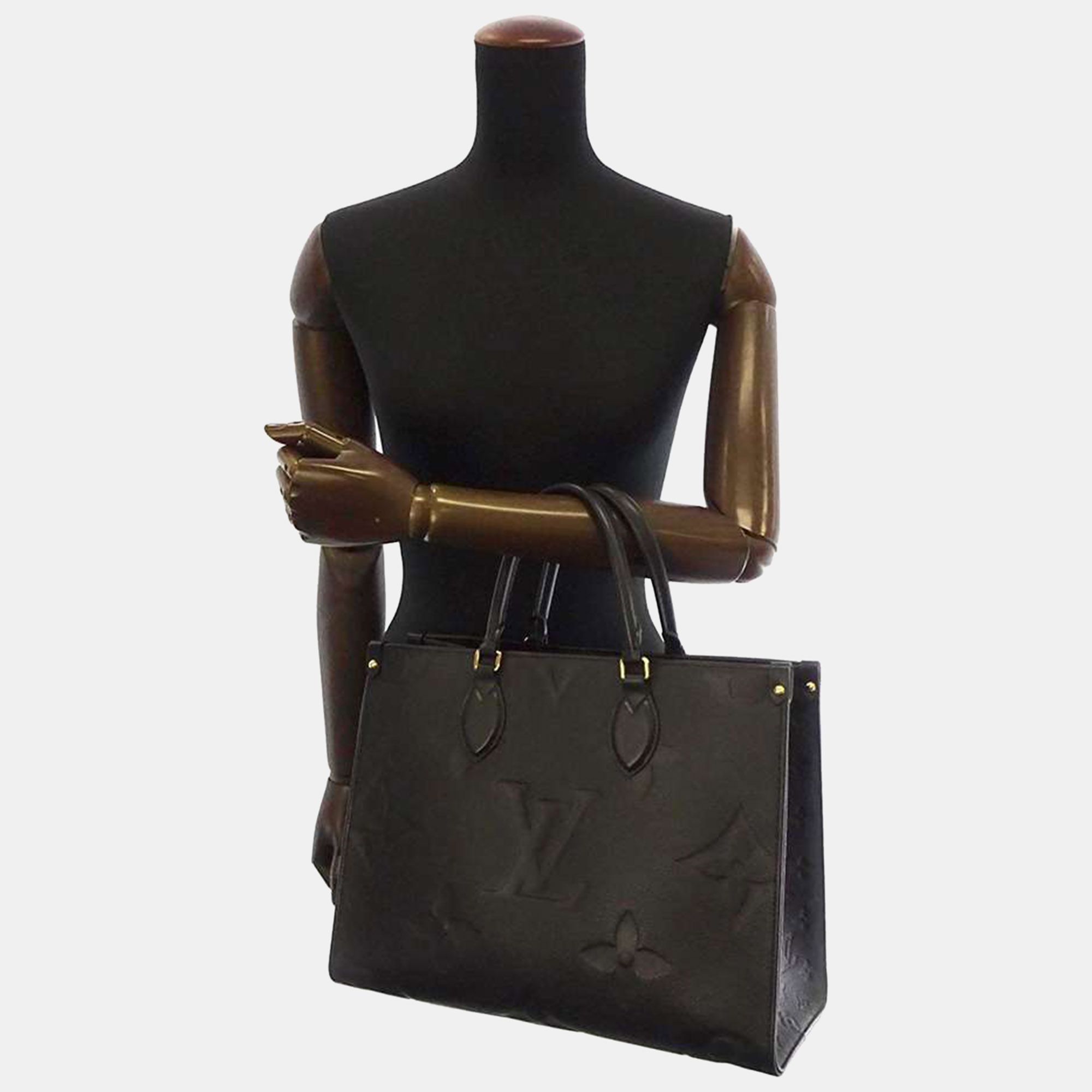 

Louis Vuitton Monogram Empreinte Leather Onthego MM, Black