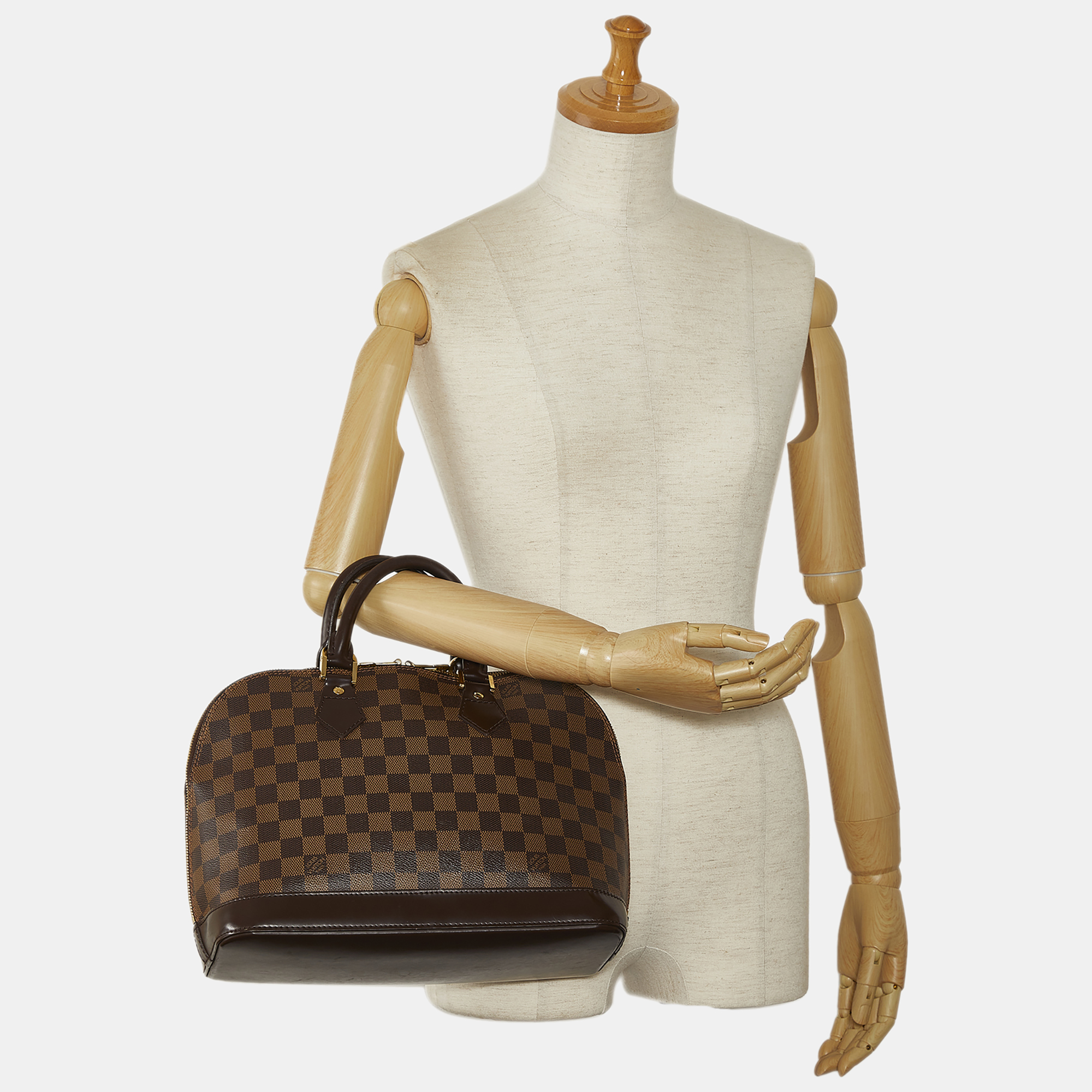 

Louis Vuitton Damier Ebene Alma MM, Brown