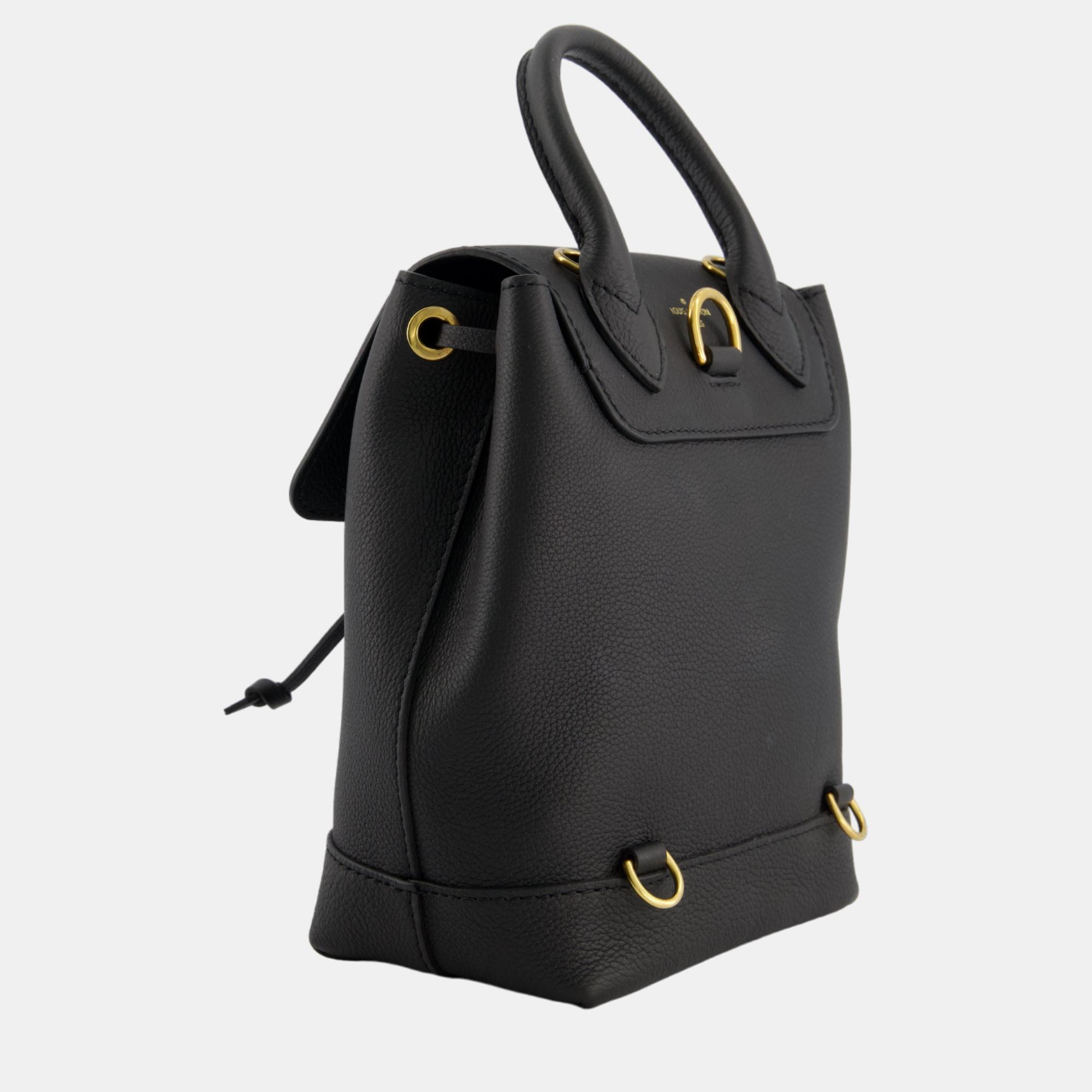 

Louis Vuitton Black Mini Lock Me Backpack Bag in Grained Leather with Gold Hardware