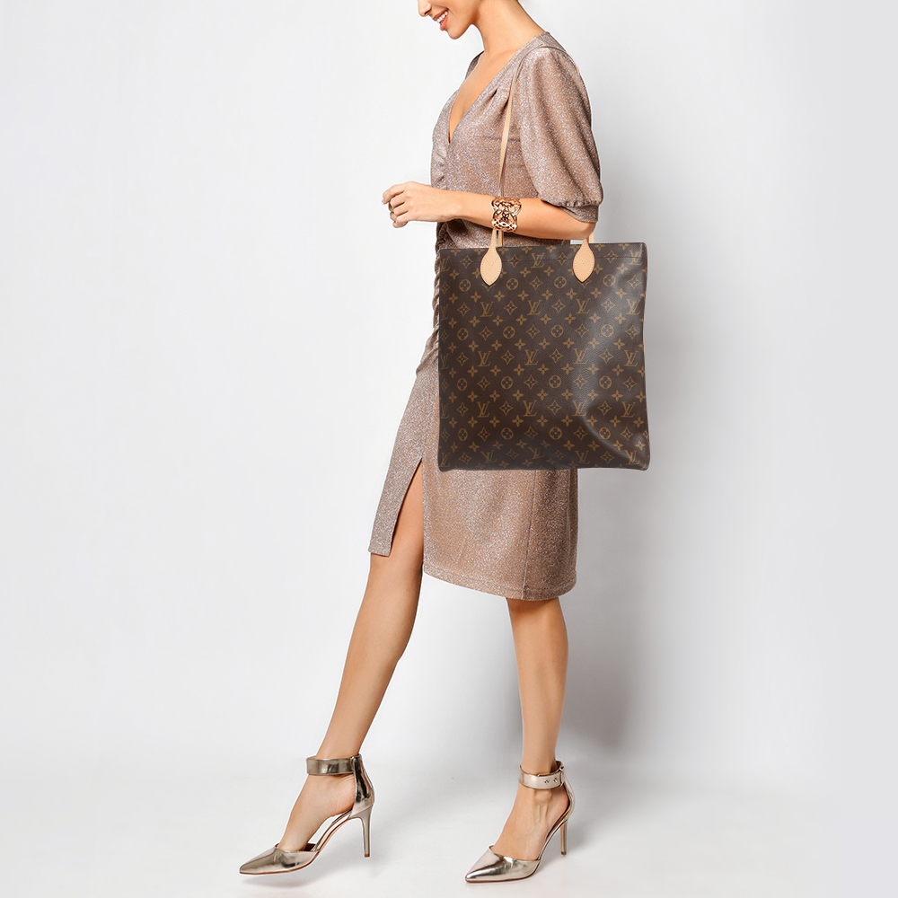 

Louis Vuitton Monogram Canvas Carry It Bag, Brown