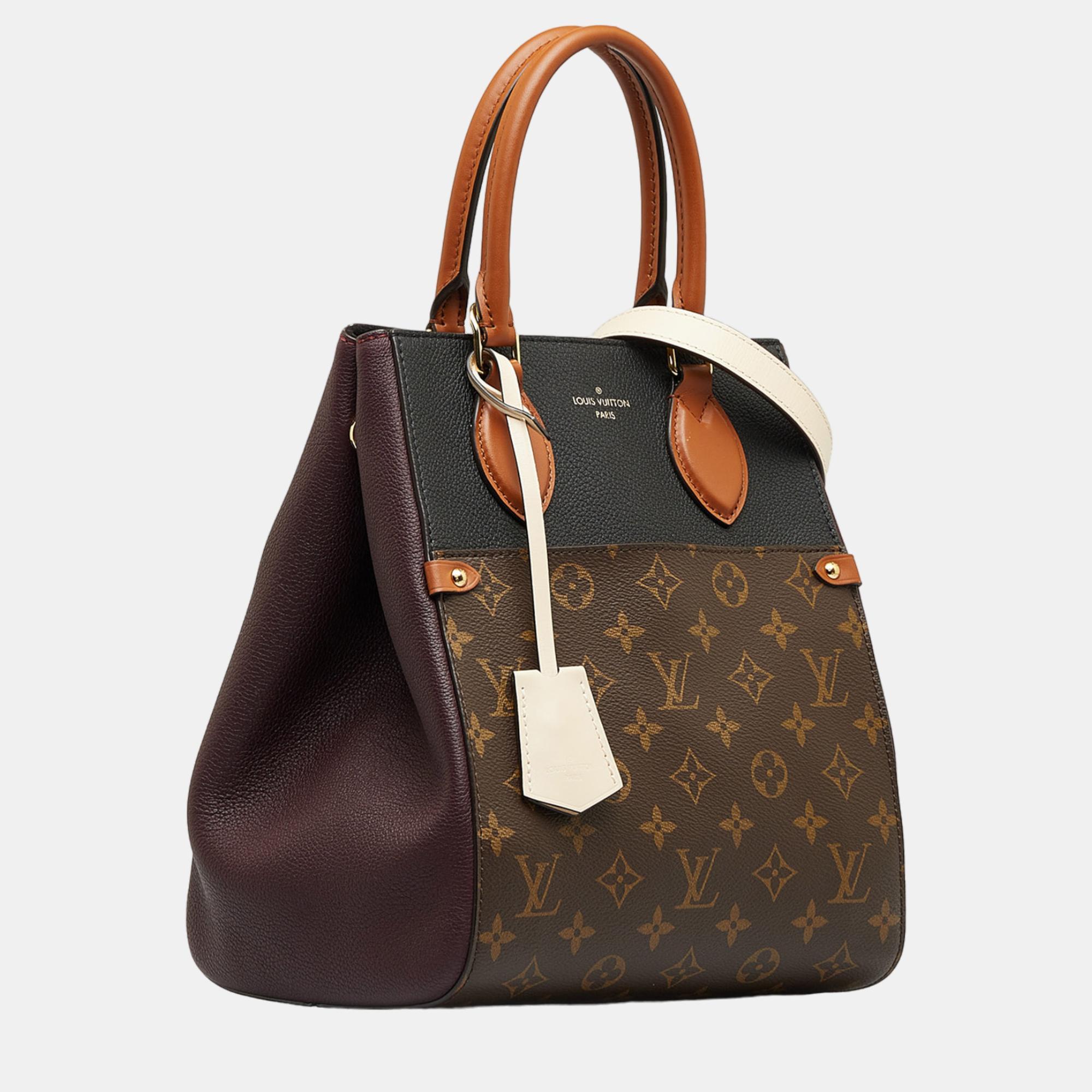 

Louis Vuitton Brown Monogram Fold Tote MM