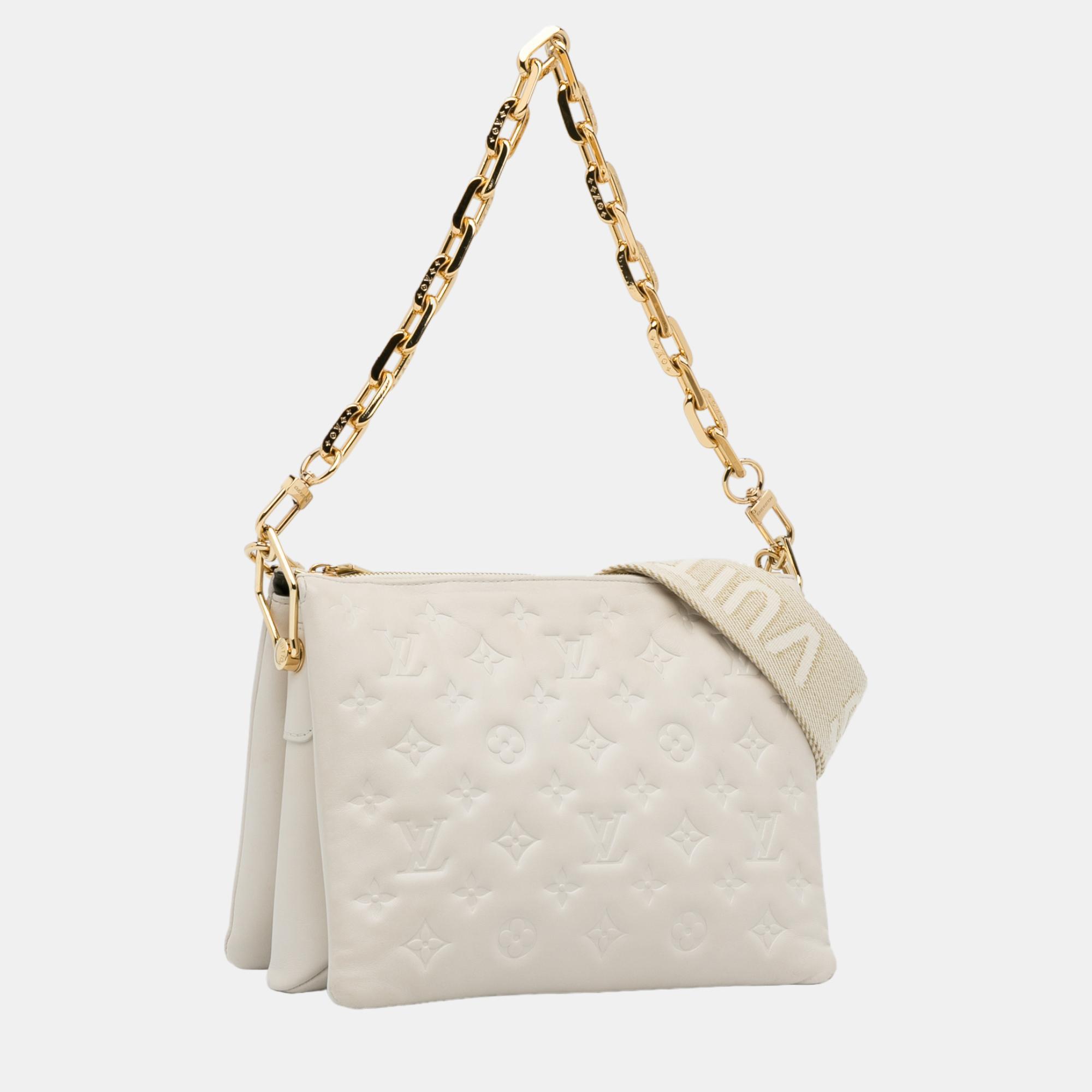 

Louis Vuitton White Monogram Coussin PM