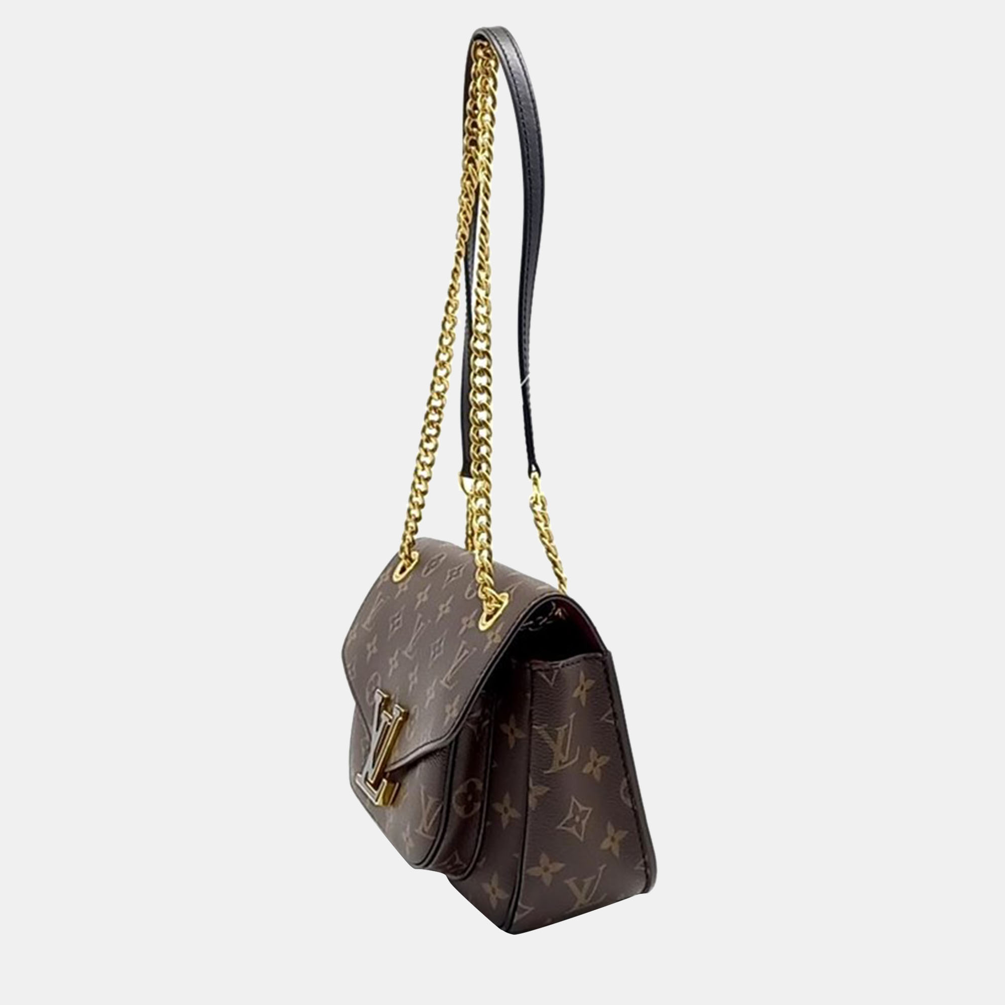 

Louis Vuitton Monogram Pochette bag, Brown