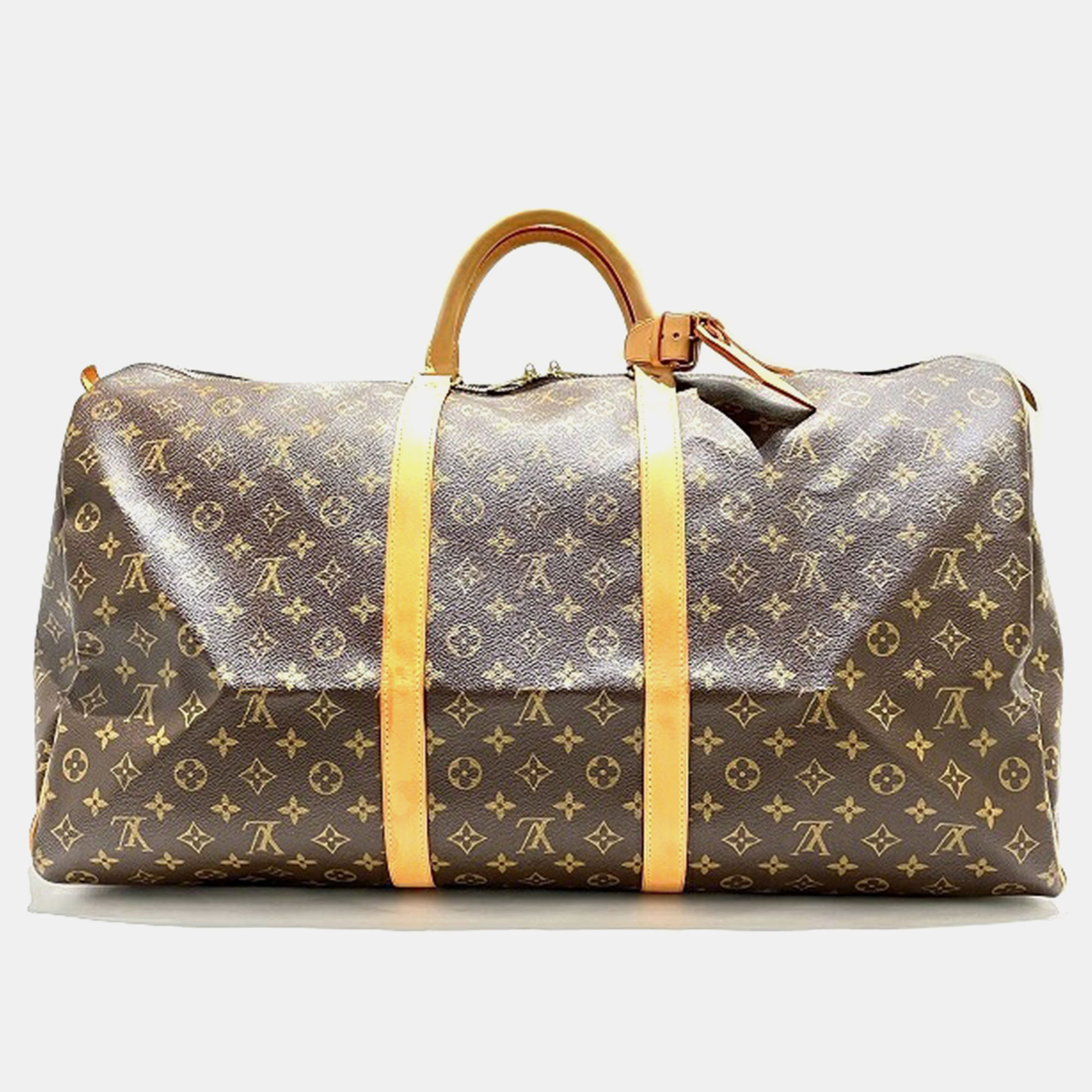 Elevate your fashion game with a Louis Vuitton duffel bag an embodiment of timeless sophistication. Crafted with precision and adorned with the iconic brand accents its a symbol of luxury and style.
