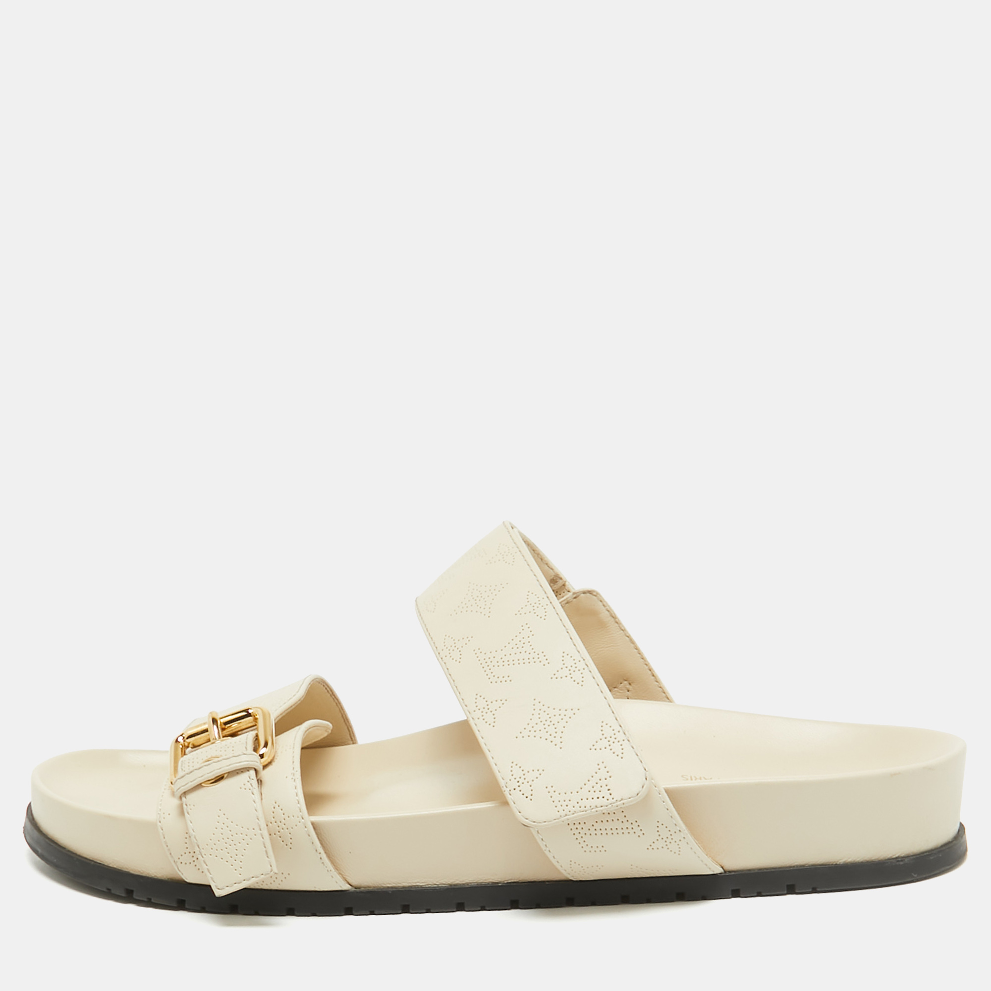 

Louis Vuitton Cream Perforated Monogram Leather Bom Dia Slides Size