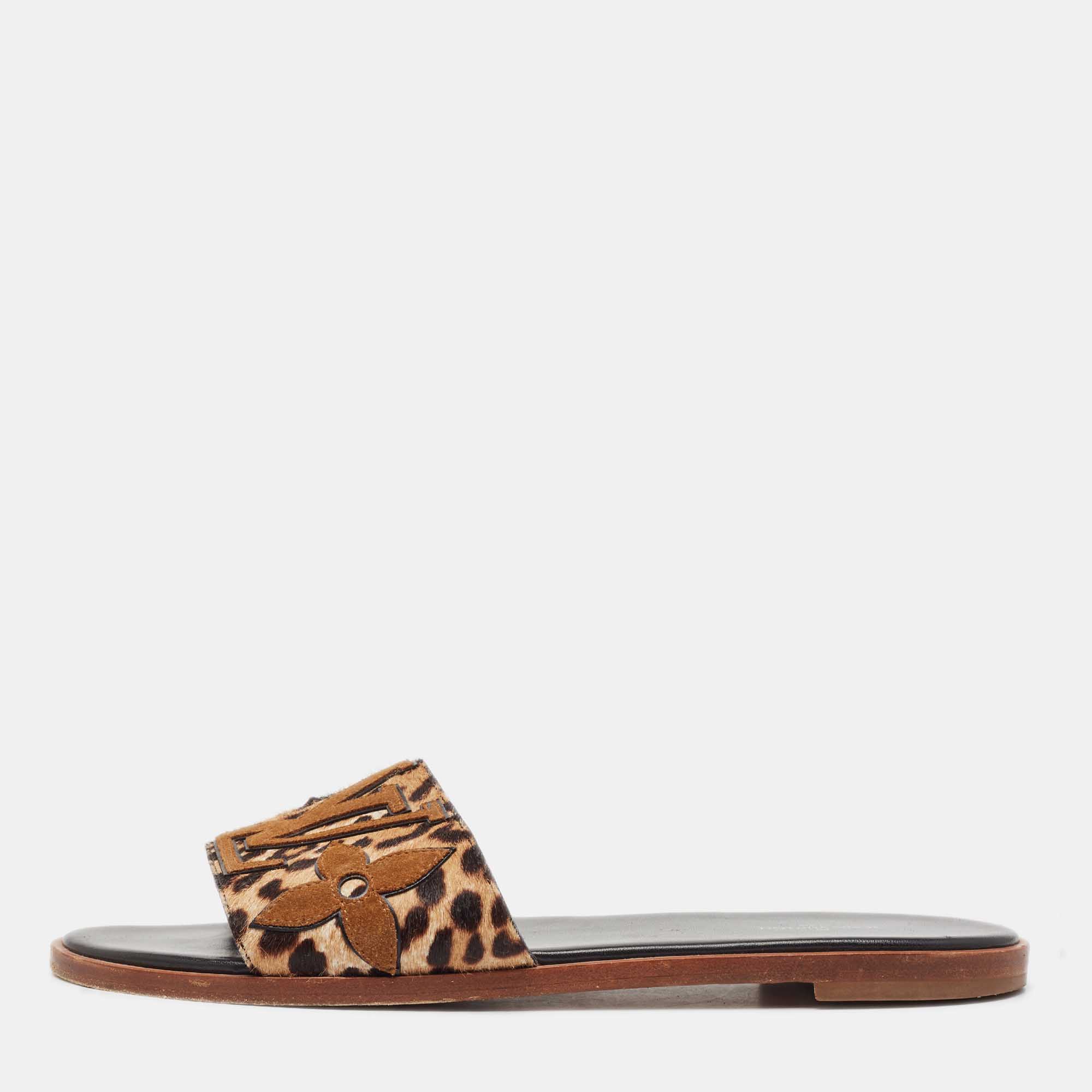 

Louis Vuitton Brown Leopard Print Calf Hair and Suede Monogram Flat Slides Size