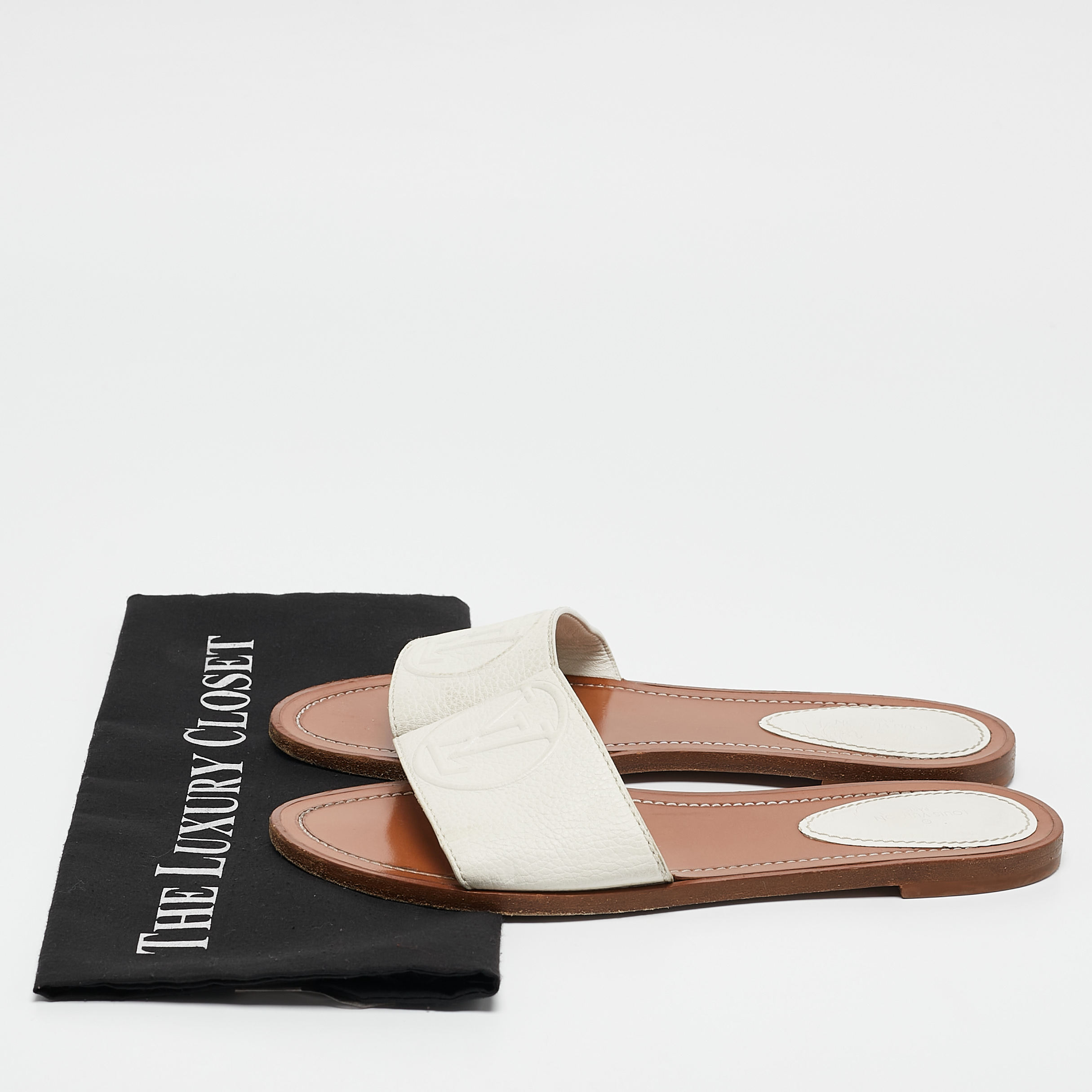Louis Vuitton White Leather Lock It Flat Slides Size 39 