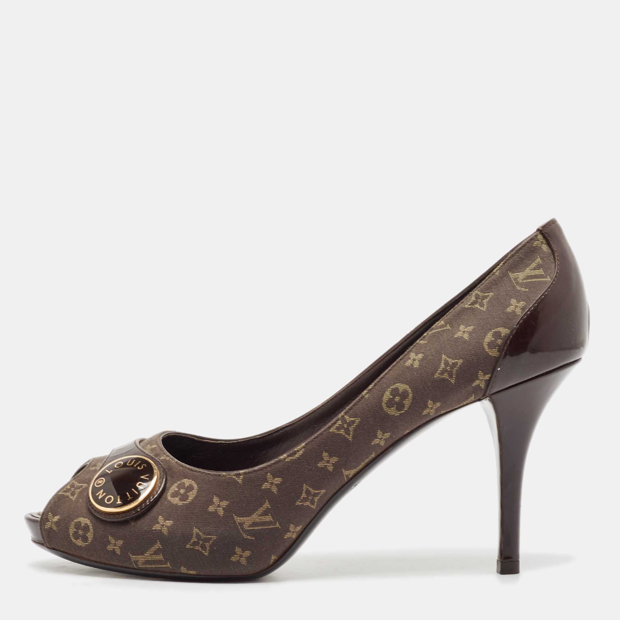 

Louis Vuitton Brown Canvas and Patent Leather Judy Peep Toe Pumps Size