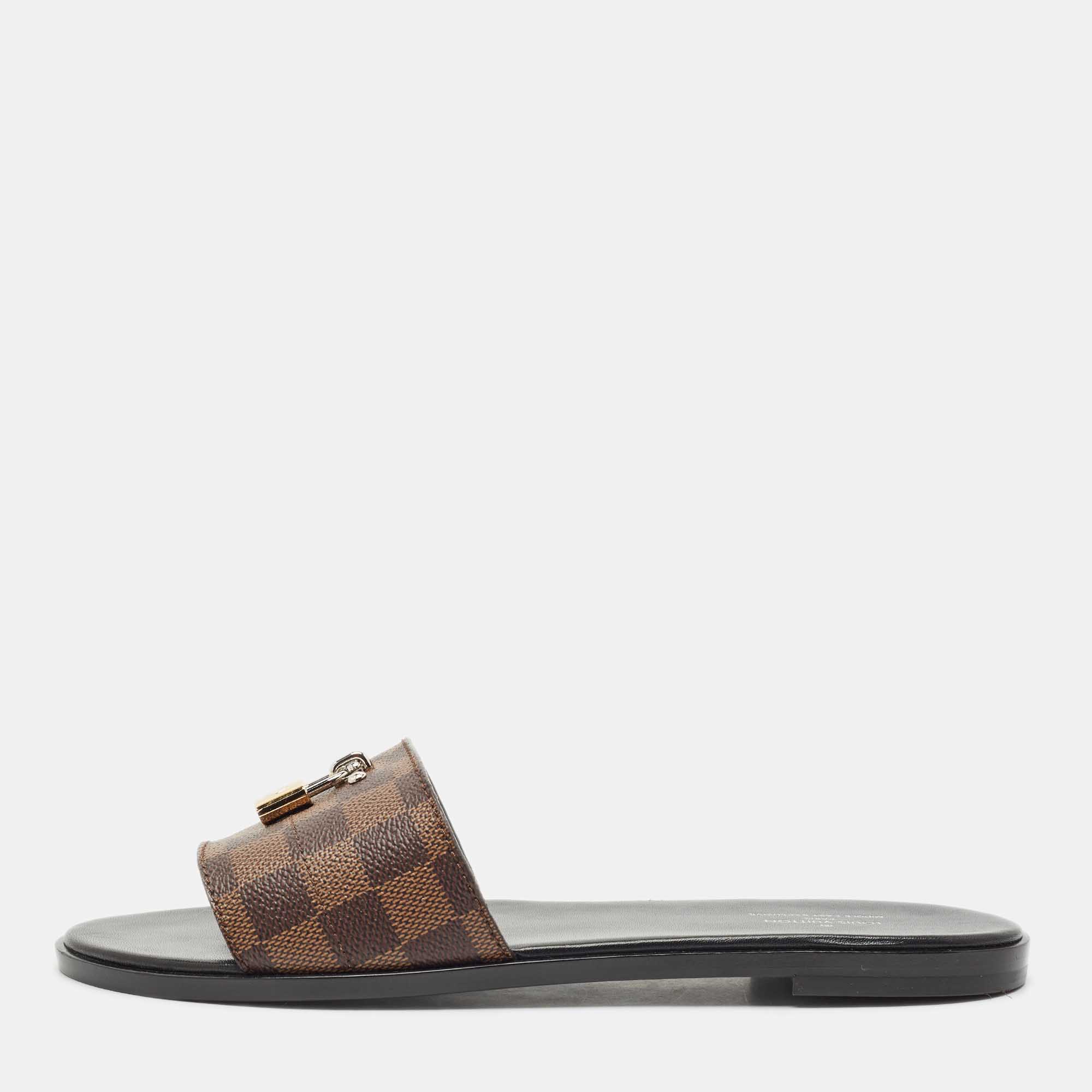 

Louis Vuitton Brown Canvas Lock It Flat Slides Size