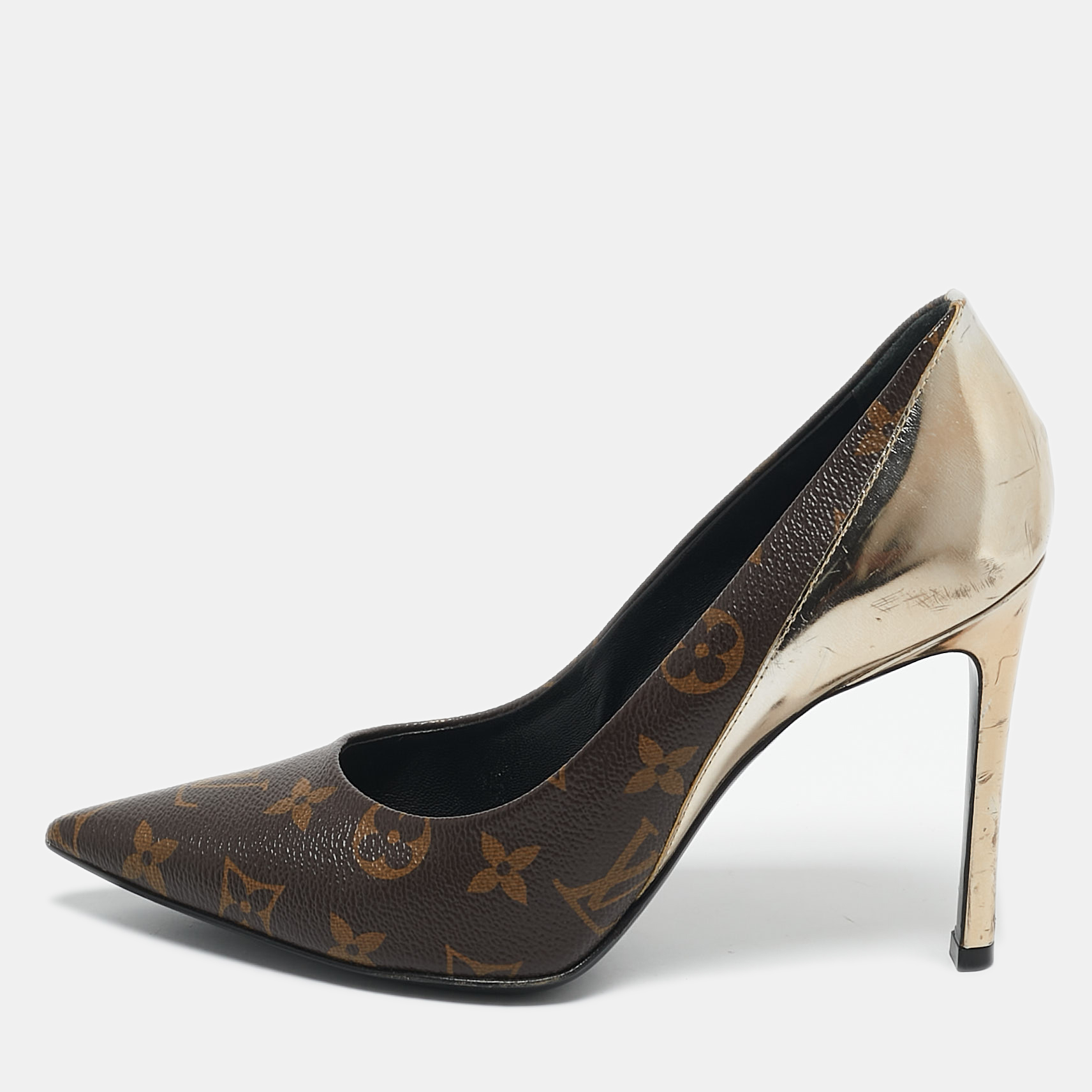 

Louis Vuitton Gold Monogram Canvas and Leather Chérie Pumps Size