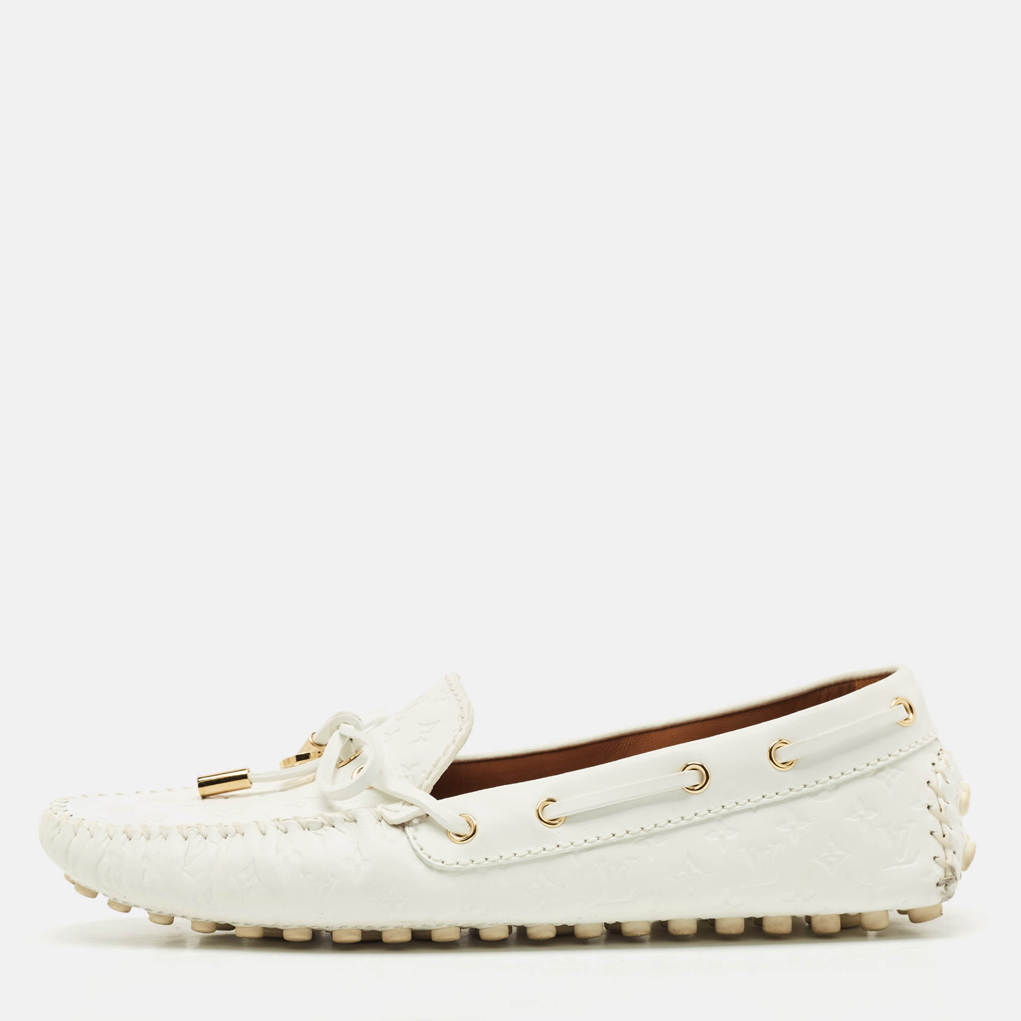 

Louis Vuitton White Monogram Empreinte Leather Gloria Loafers Size