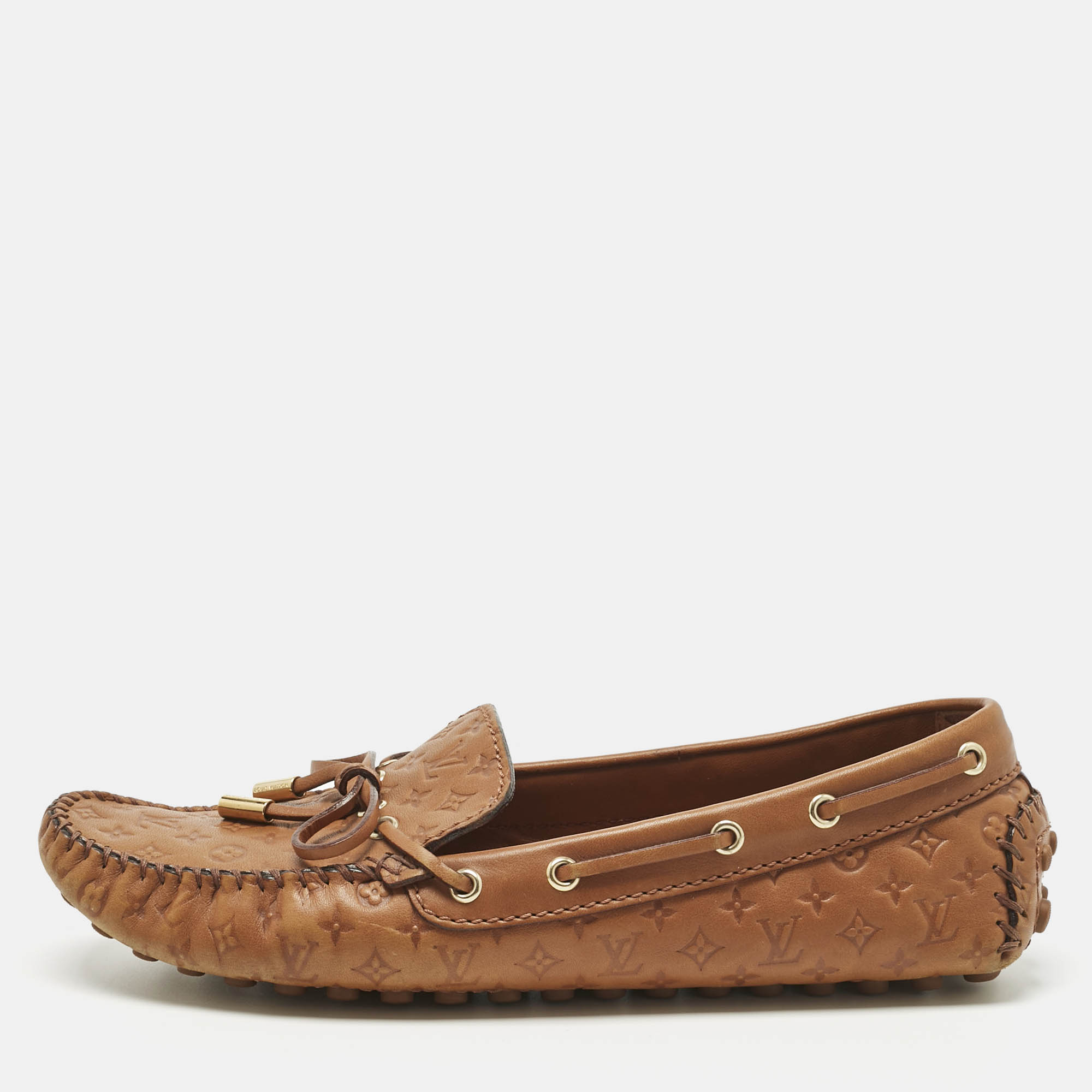 

Louis Vuitton Brown Monogram Empreinte Leather Gloria Loafers Size